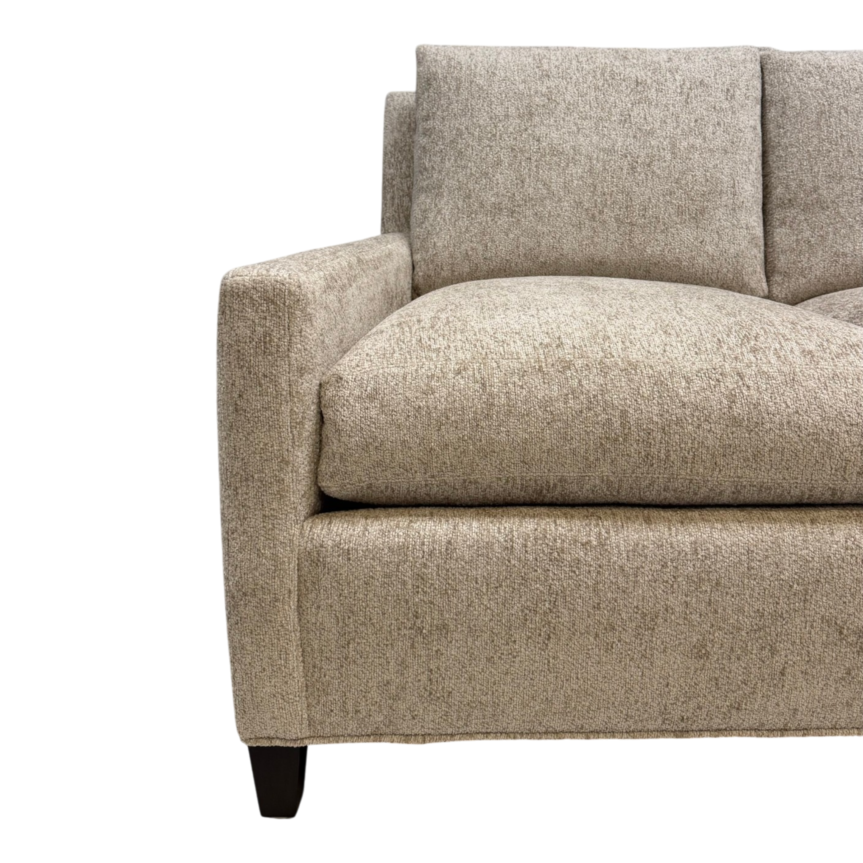 Close-up of the Weston Sofa showing the tailored track arm, deep seat cushion and textured Foundry Sand chenille upholstery.