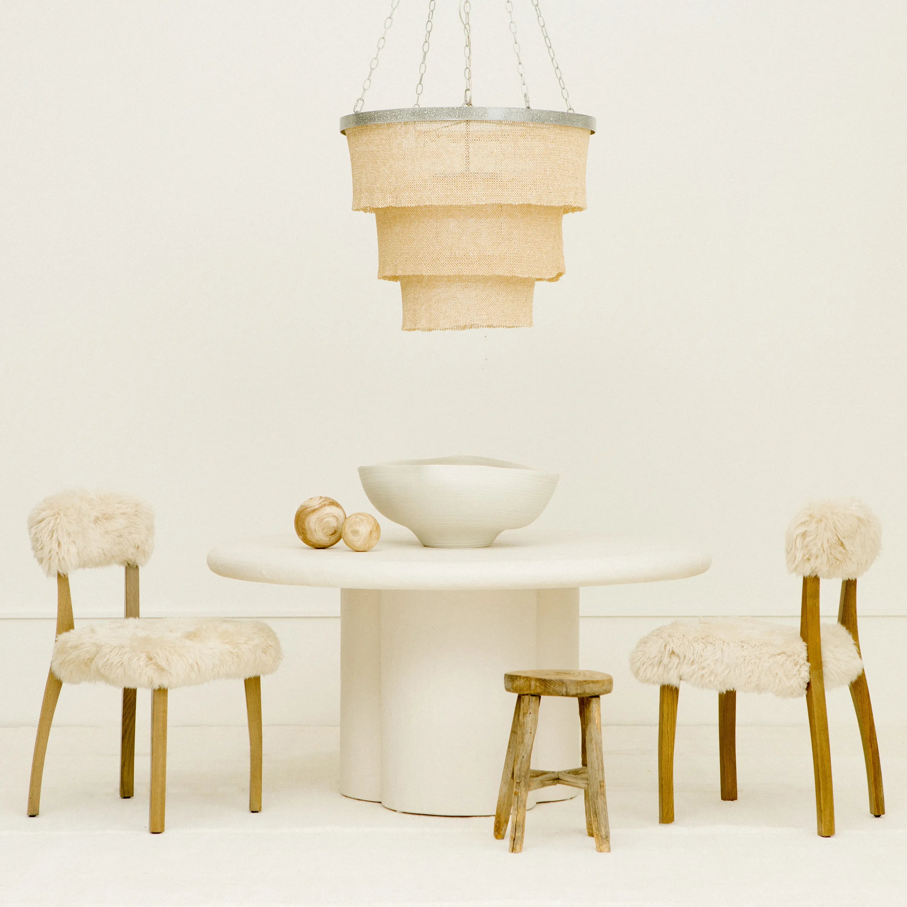The Tiered Coco Bead Chandelier features clingy panels.