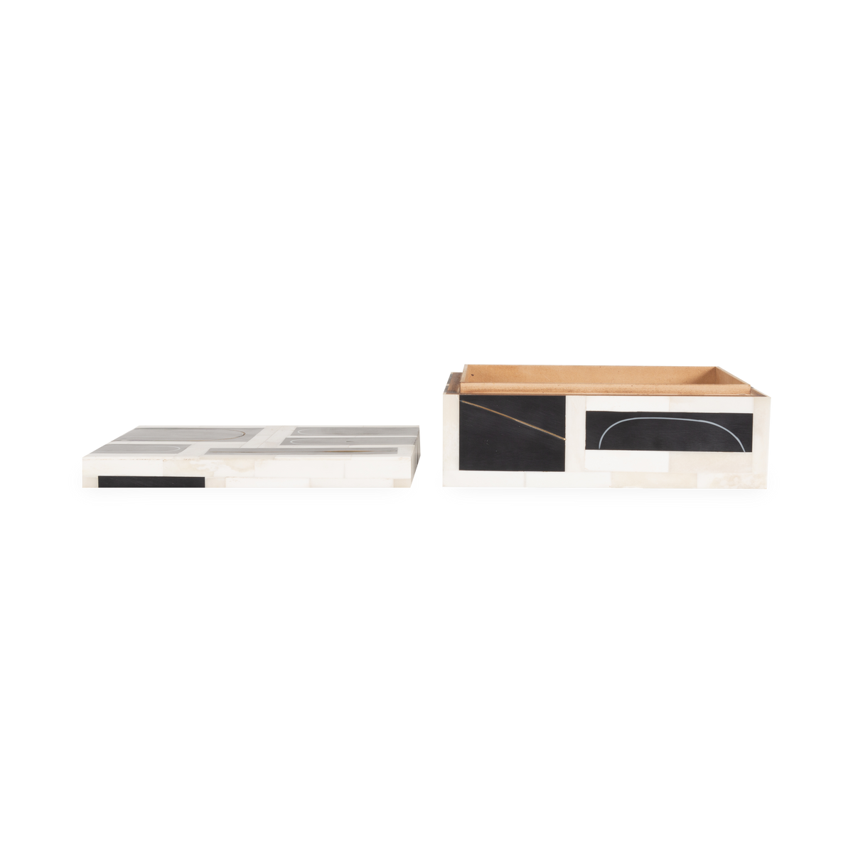 A resin and bone exterior features a brass filet loop that is inlaid.