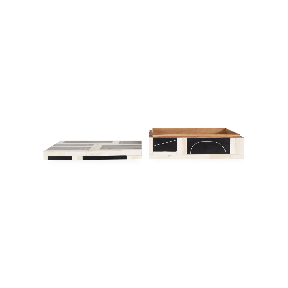 A resin and bone exterior features a brass filet loop that is inlaid.