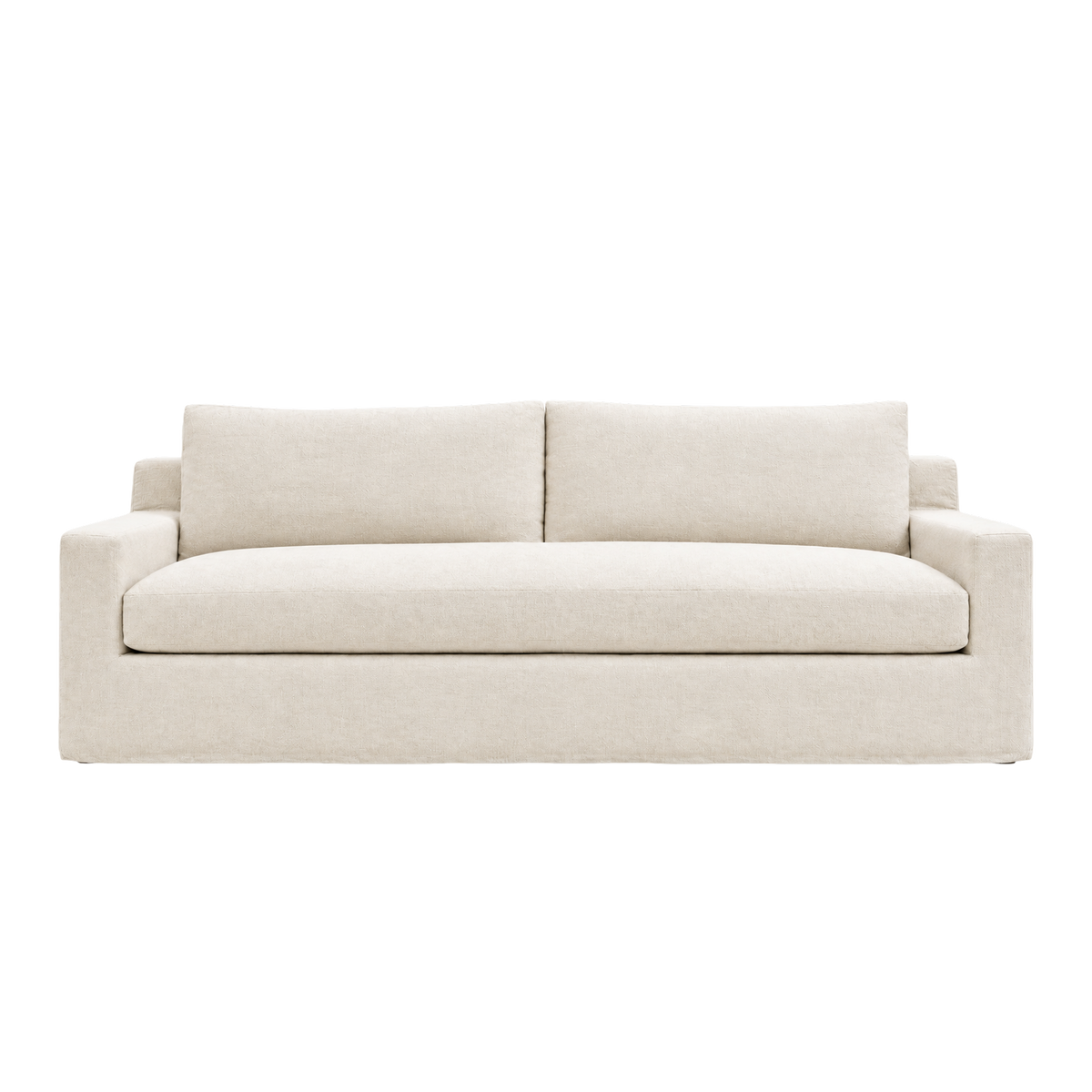 Babylon Sofa shown from the front in natural linen, with structured track arms, a deep bench seat cushion, two back cushions and a fully upholstered waterfall base.