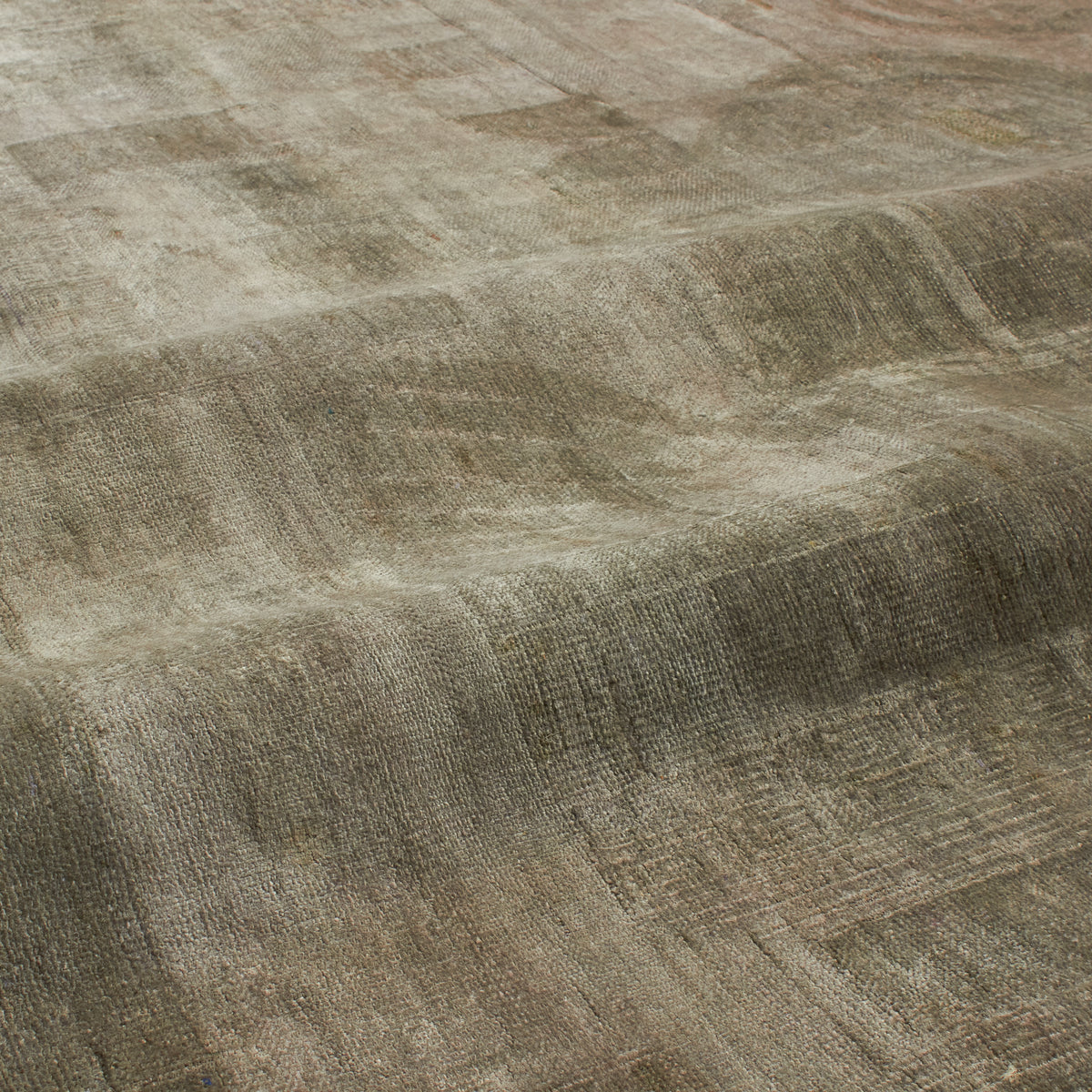 Designed to be passed through generations, the New Heirloom Rug Collection is crafted from recycled and upcycled wool, cocoon silk and sari silk.