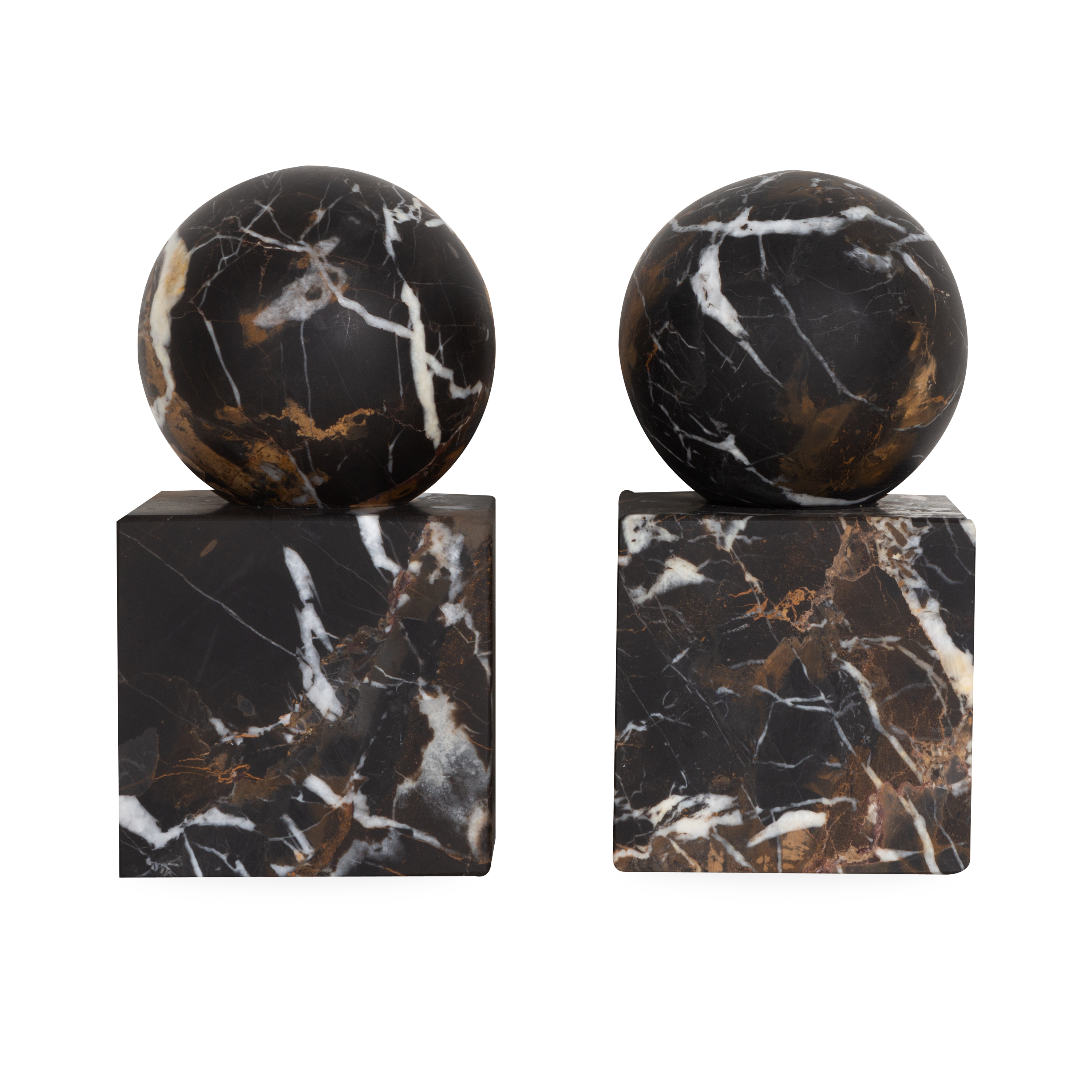 The Honed Marble Bookends feature a geometrical silhouette with a sphere sitting on a cube.