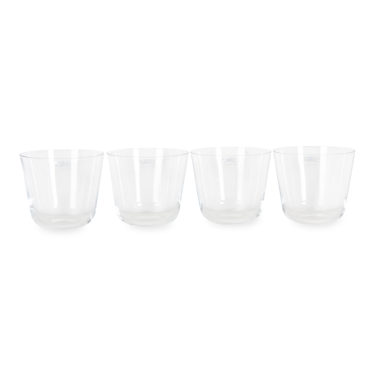 Elevating your glassware collection, the Arc Tumbler Glasses come in a set of four and features rounded bases and softly tapered profiles.
