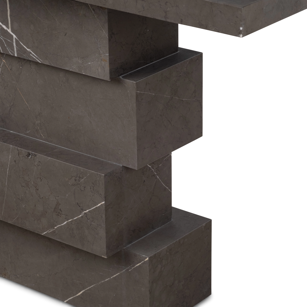 Balance Console Table detail view in warm gray Petra Grey marble, highlighting the crisp squared edges where each stacked block shifts past the one below.