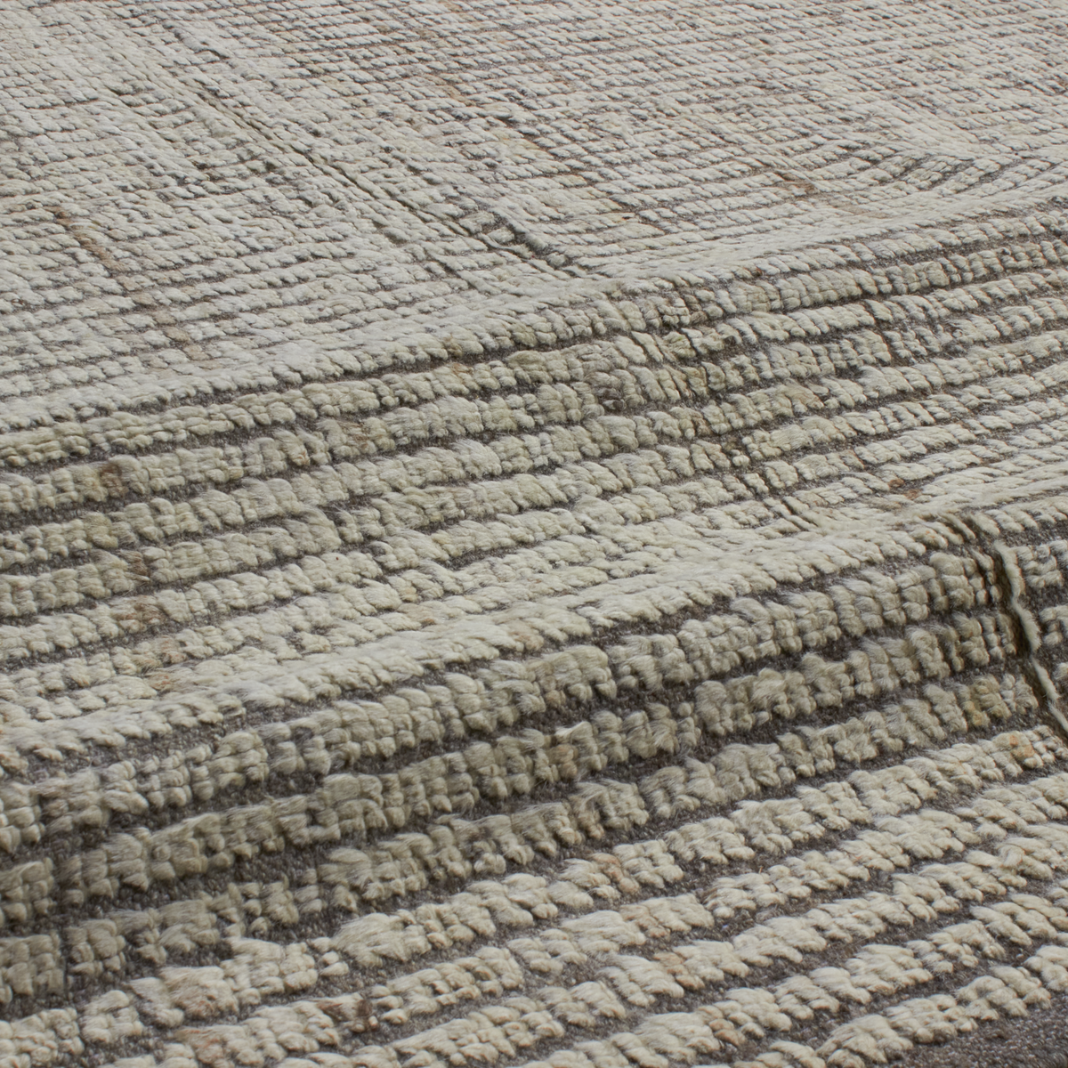 Revered for its lustre and soft hand, the natural qualities of wool from ancient Karakul sheep are honoured through restraint and refinement.