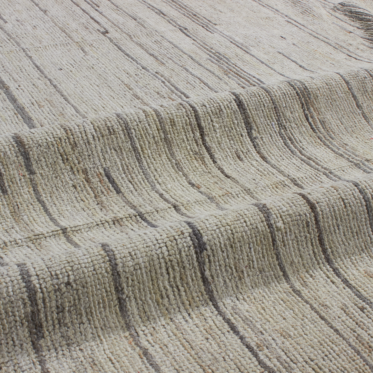 Revered for its lustre and soft hand, the natural qualities of wool from ancient Karakul sheep are honoured through restraint and refinement.