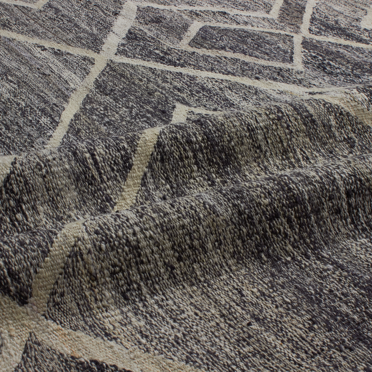 Revered for its lustre and soft hand, the natural qualities of wool from ancient Karakul sheep are honoured through restraint and refinement.