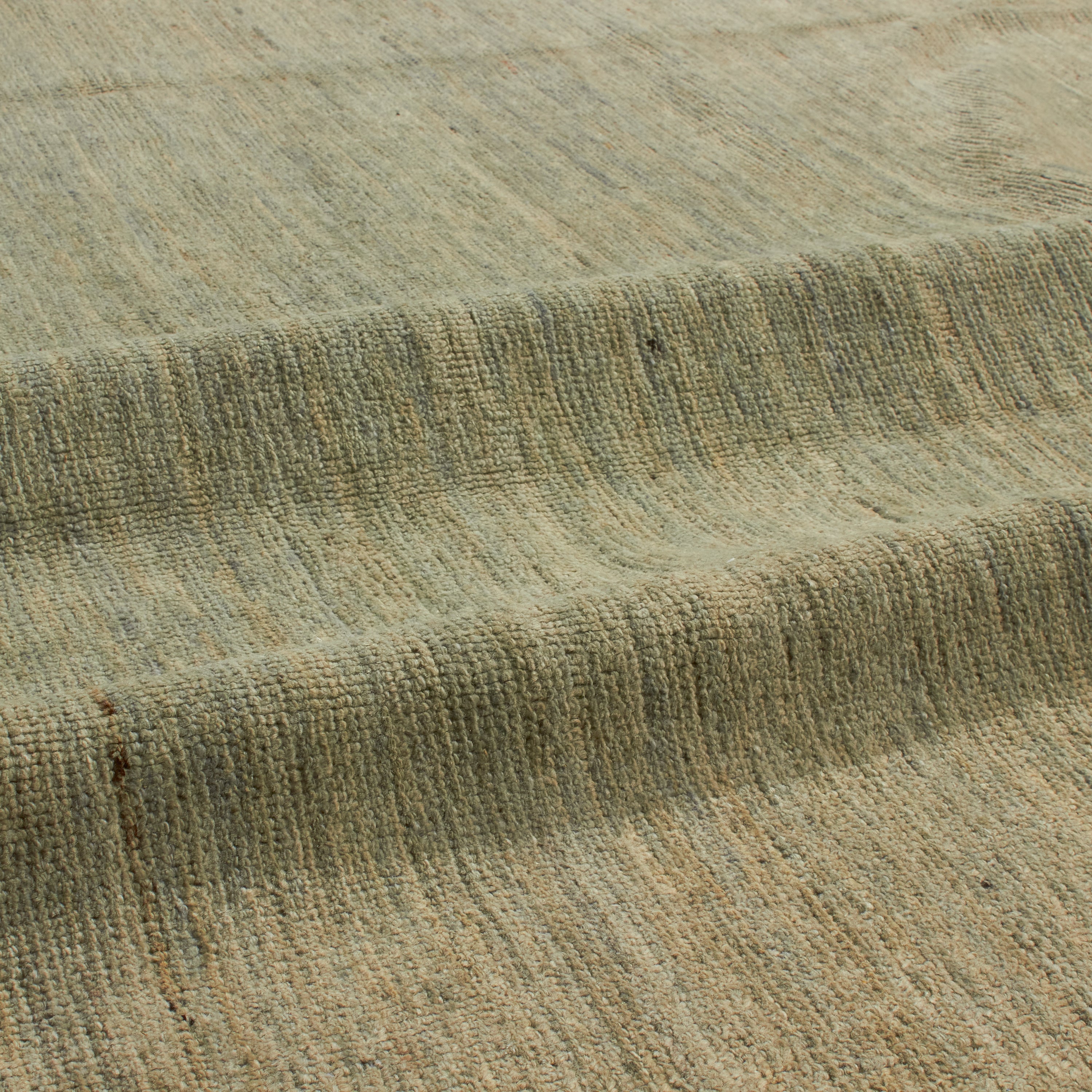 Revered for its lustre and soft hand, the natural qualities of wool from ancient Karakul sheep are honoured through restraint and refinement.