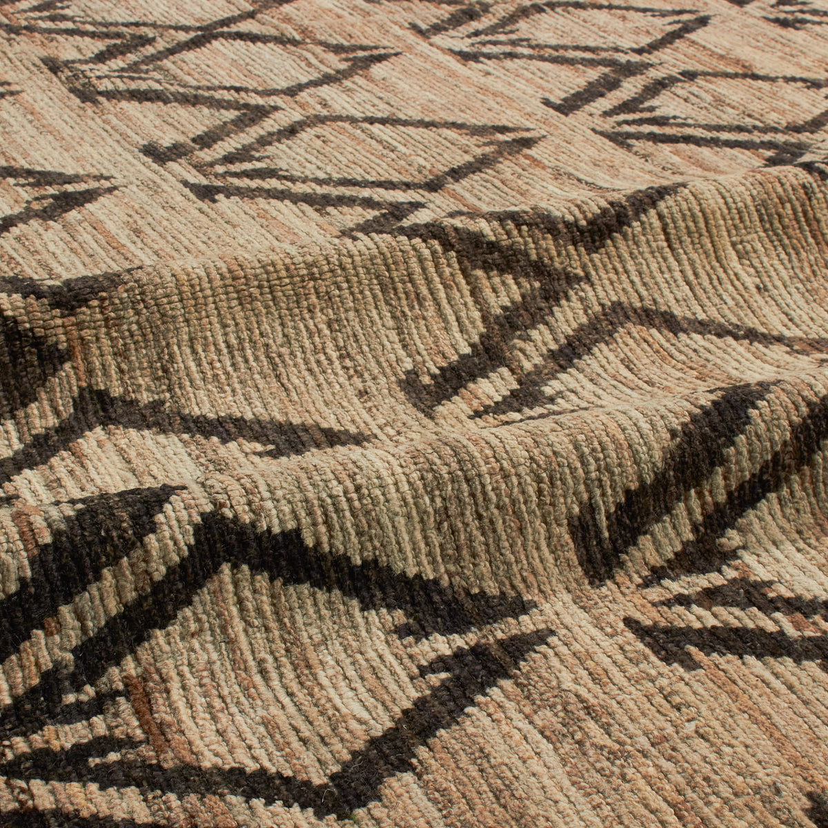 Revered for its lustre and soft hand, the natural qualities of wool from ancient Karakul sheep are honoured through restraint and refinement.
