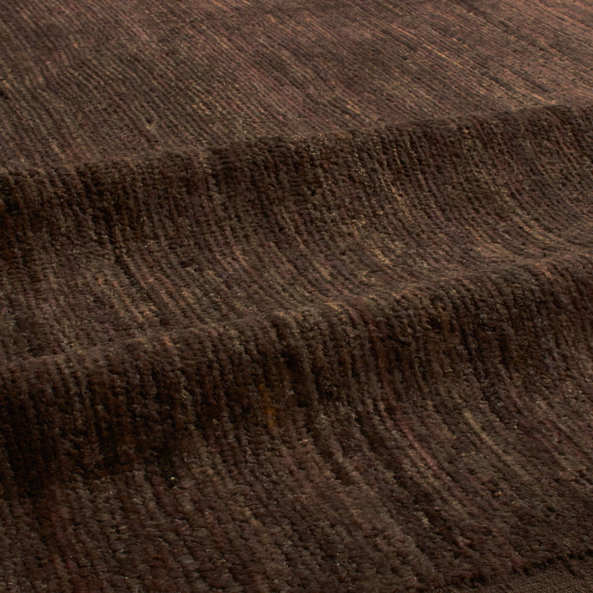 Revered for its lustre and soft hand, the natural qualities of wool from ancient Karakul sheep are honoured through restraint and refinement.
