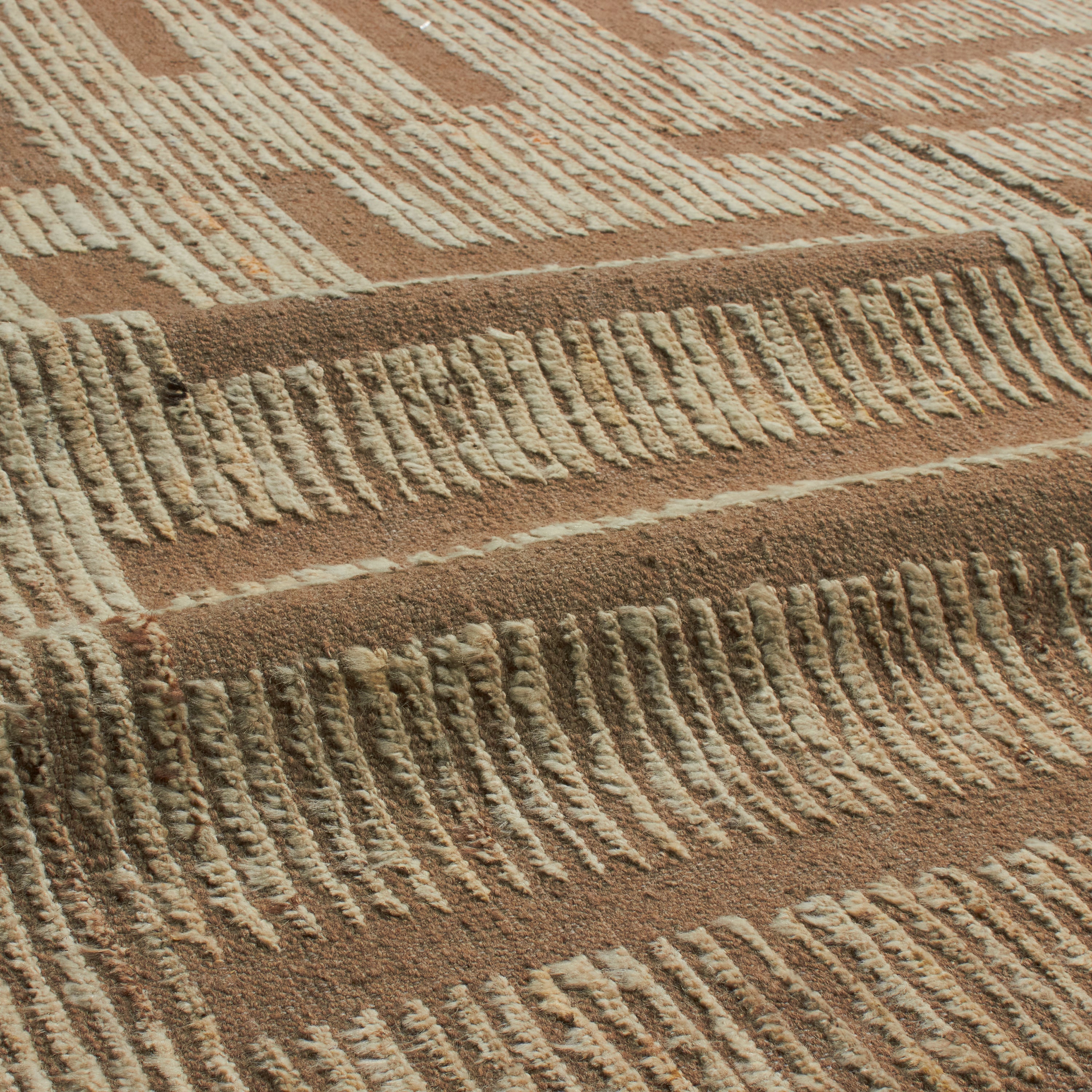 Revered for its lustre and soft hand, the natural qualities of wool from ancient Karakul sheep are honoured through restraint and refinement.