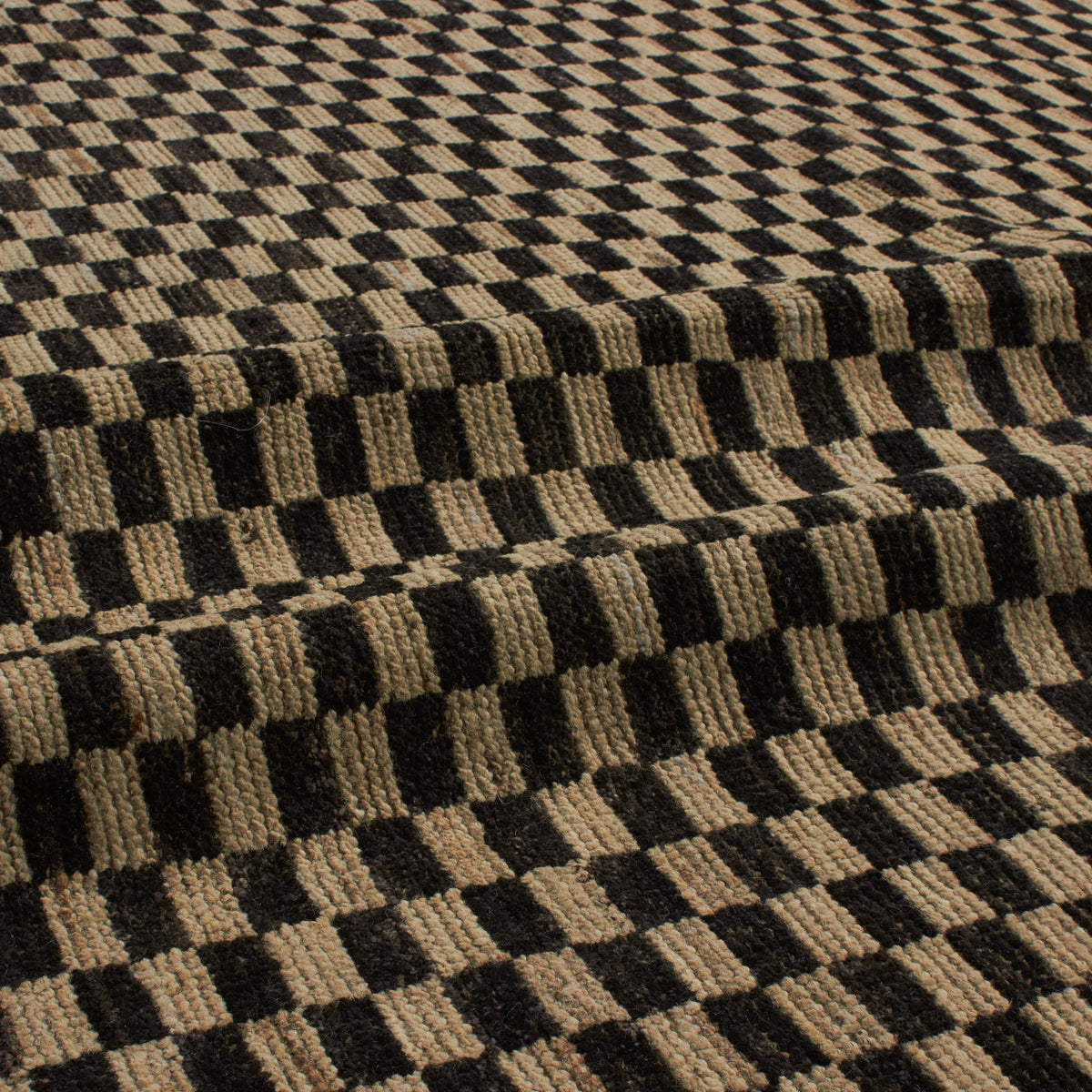 Revered for its lustre and soft hand, the natural qualities of wool from ancient Karakul sheep are honoured through restraint and refinement.