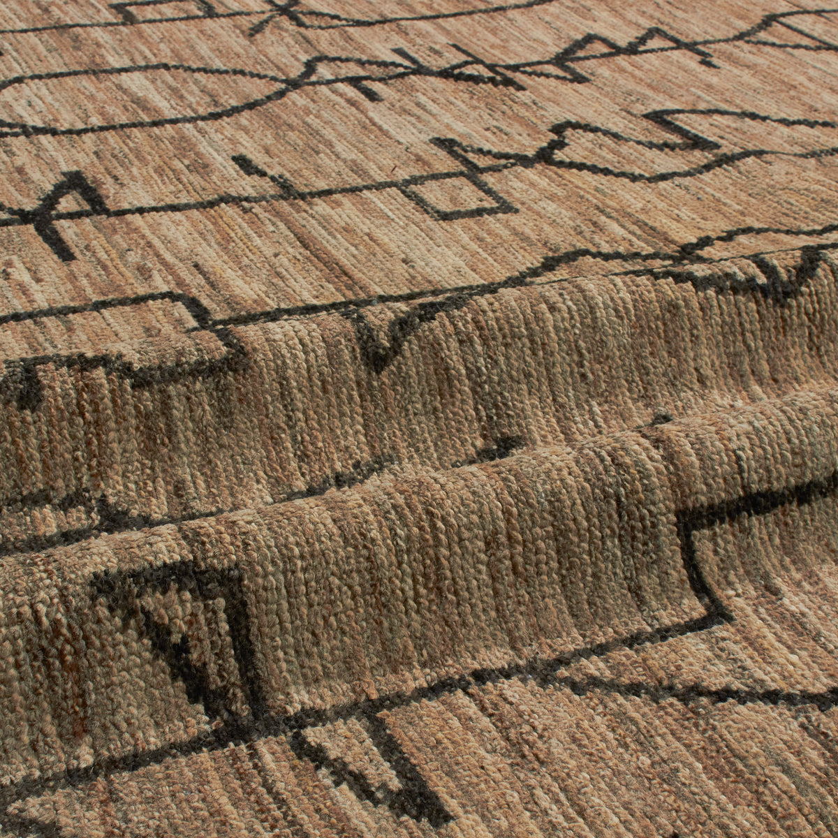 Revered for its lustre and soft hand, the natural qualities of wool from ancient Karakul sheep are honoured through restraint and refinement.