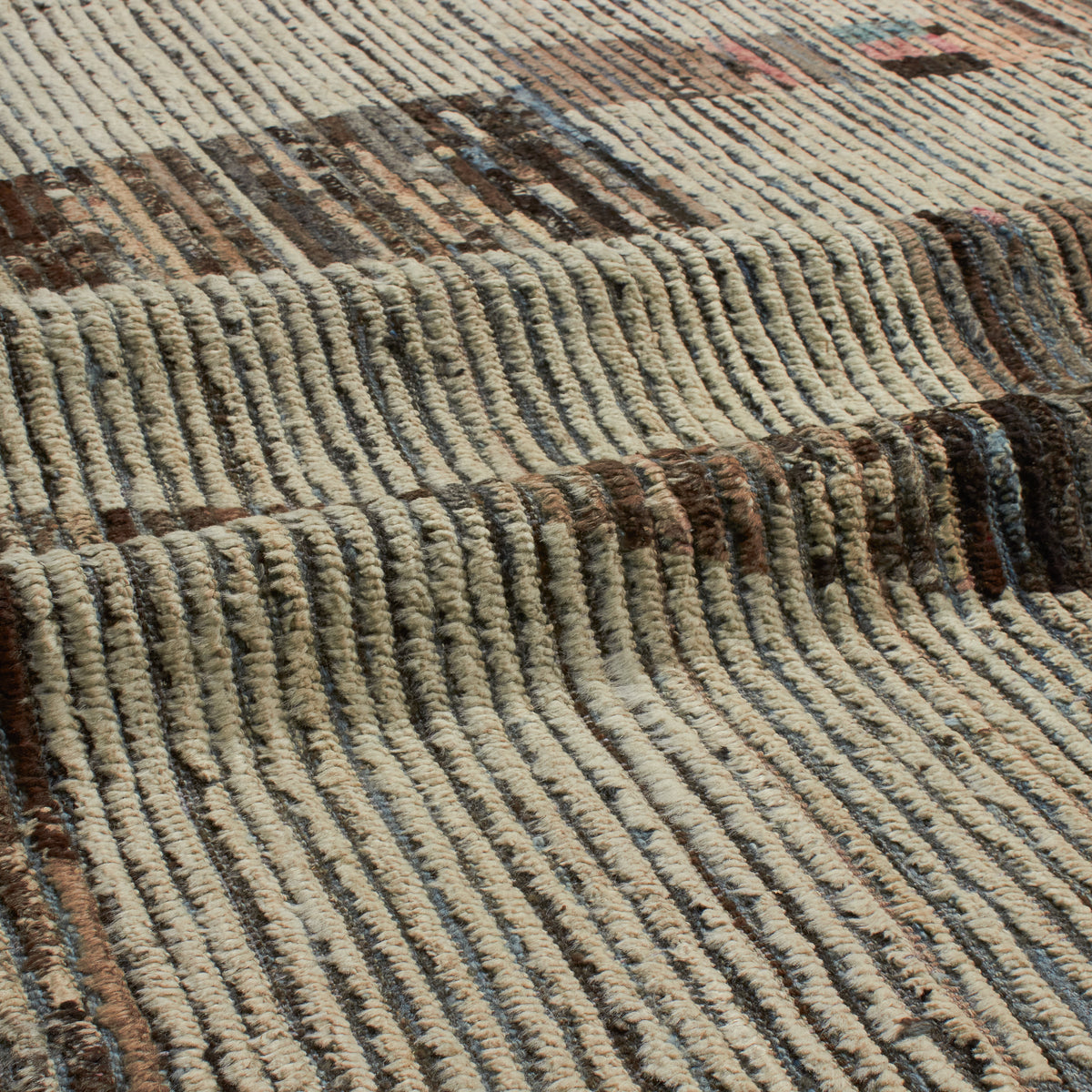 Revered for its lustre and soft hand, the natural qualities of wool from ancient Karakul sheep are honoured through restraint and refinement.