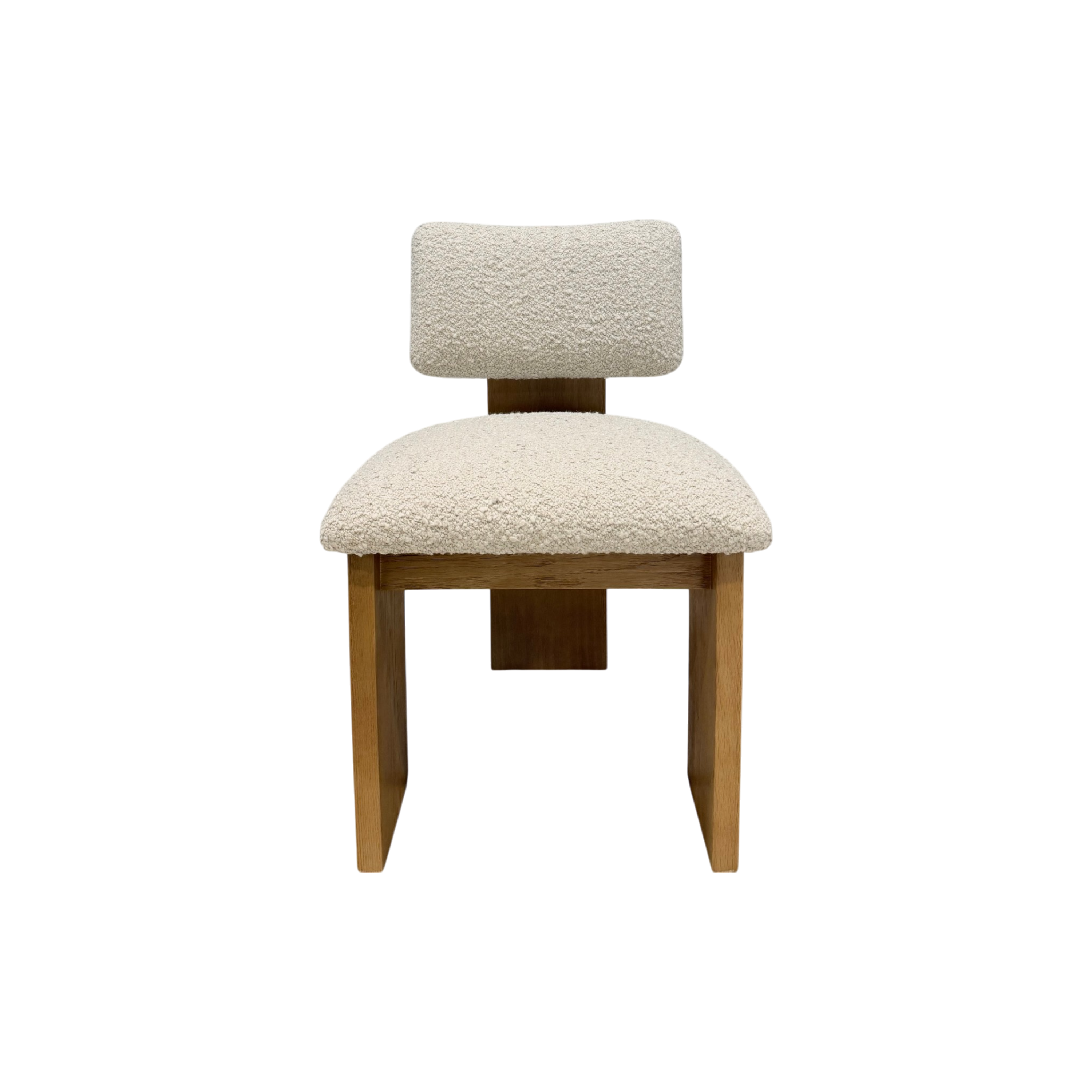 A modern accent chair with a textured cream bouclé upholstered seat and backrest, supported by a light brown wooden frame, shown against a plain white background.