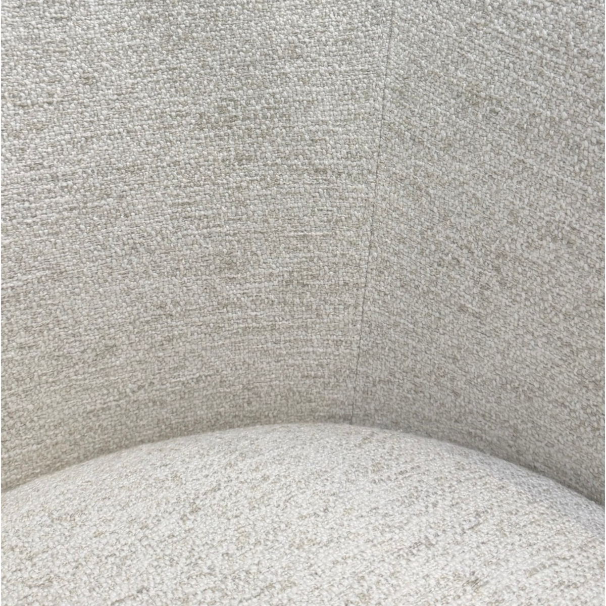 Close-up of Sigma Lounge Chair interior showing the textured Grey Oak upholstery across the curved back and seat.