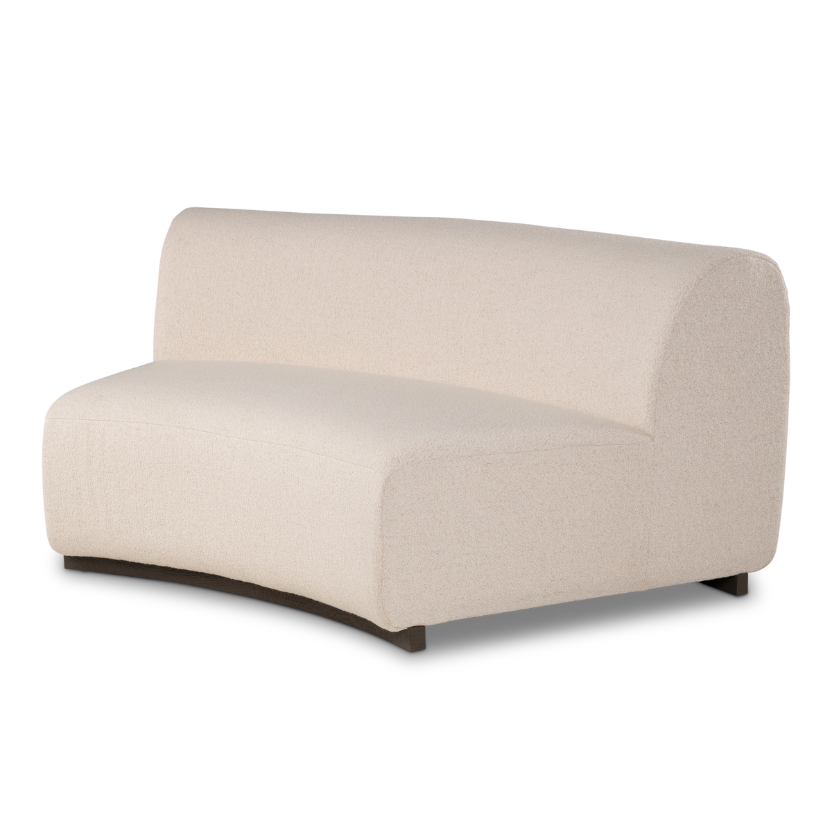 Angled view of the Rhine Modular Armless Chair in cream bouclé, showing the arced seat front, the gently angled back, and the dark sculpted base curving along the bottom.