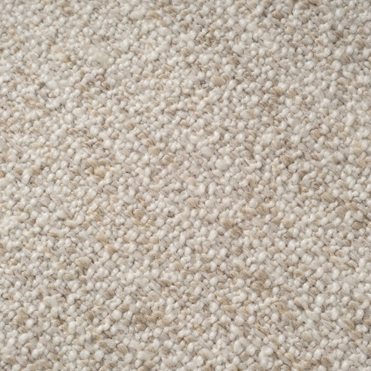 Close-up showing the Oatmeal textured fabric used on the Kore Taper Arm Sofa, with a nubby, looped weave in creamy white and tan flecks.