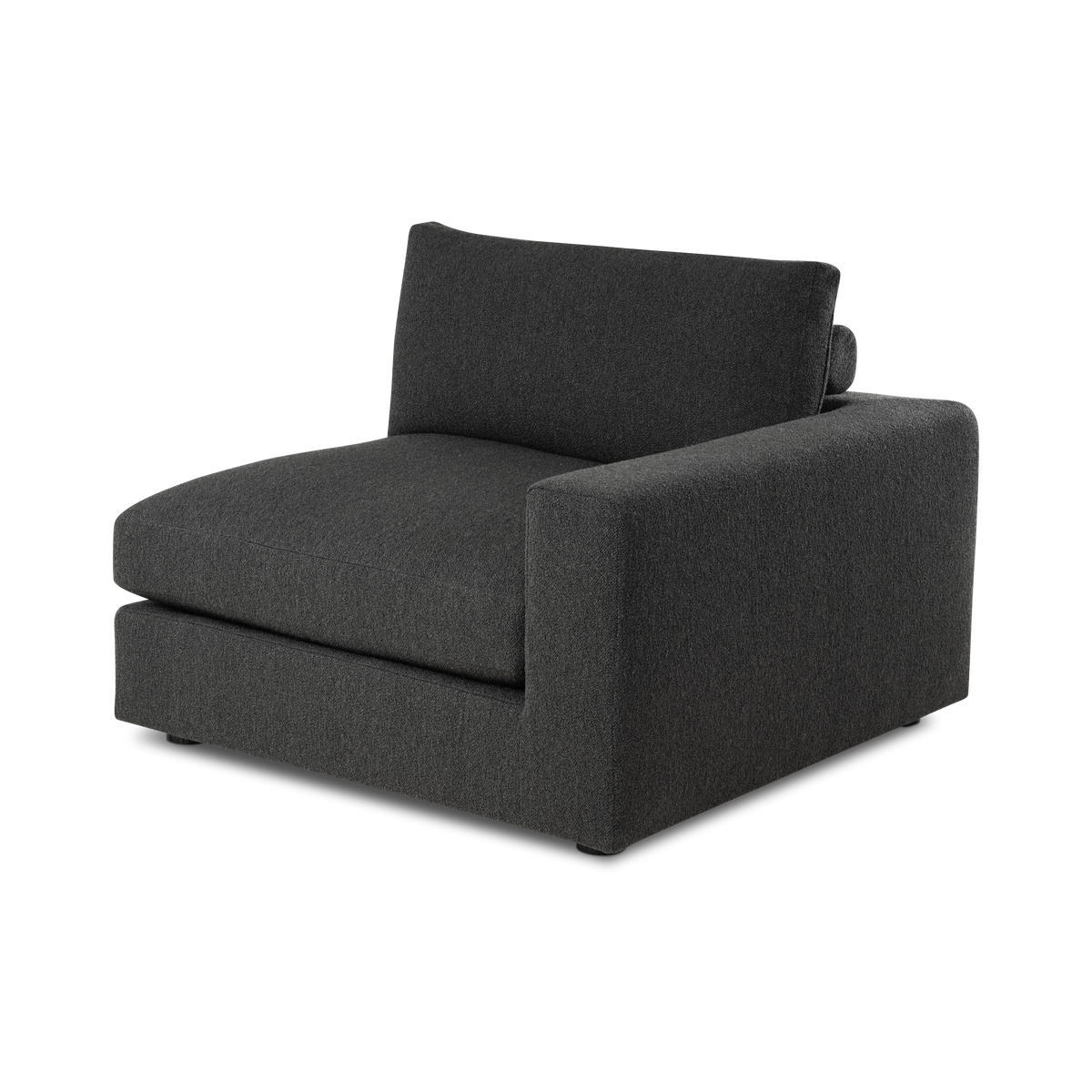 Colonna Modular RAF Chair shown in an angled view in charcoal bouclé, highlighting the wide square arm, the deep seat cushion, and the bolster tucked behind the loose back cushion.