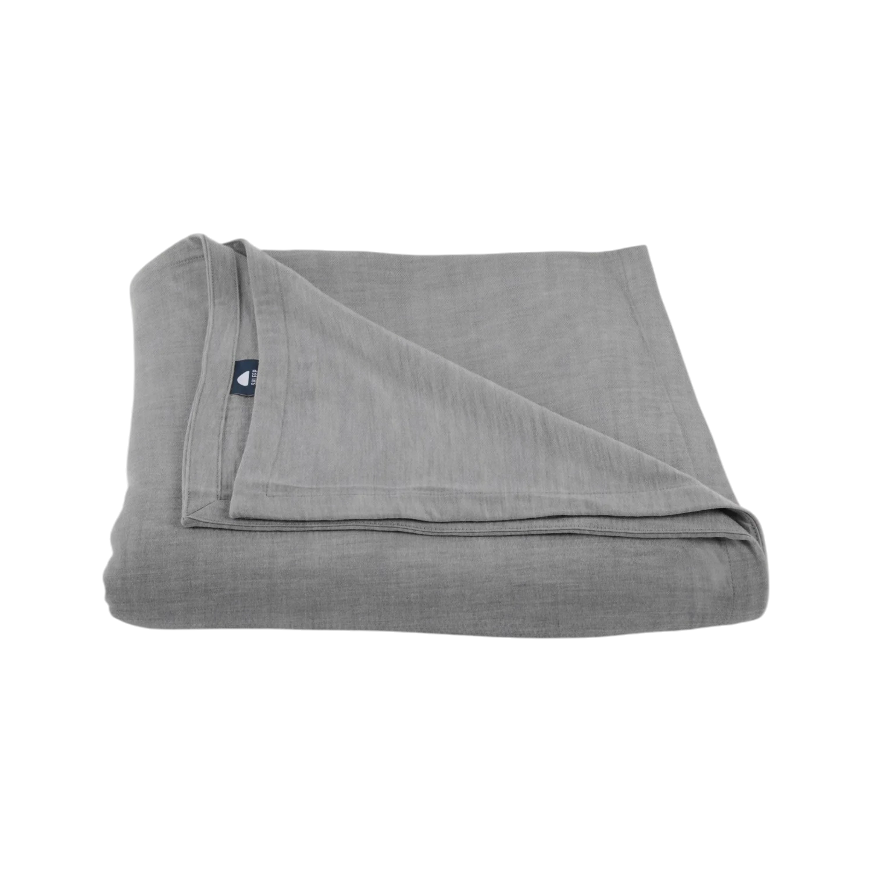 Merino Flat Sheet Queen in Granite grey Merino Jersey, folded to show the soft drape, double-layered top edge and stitched finish.