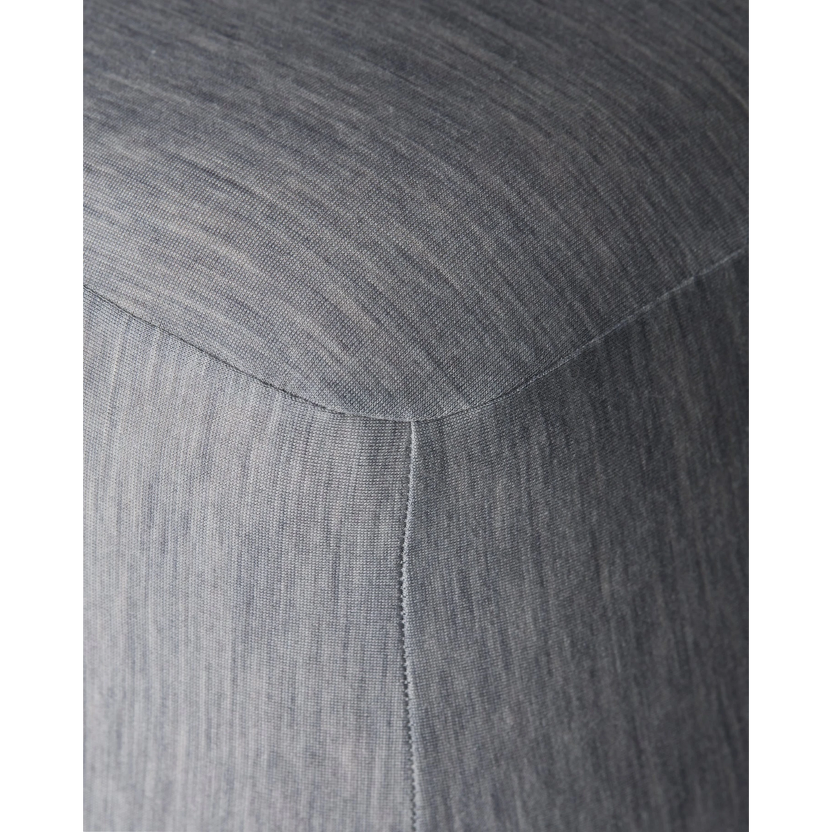 Close-up of Merino Fit Sheet Queen in Granite grey showing the smooth jersey texture, fitted corner and tailored seam detail.