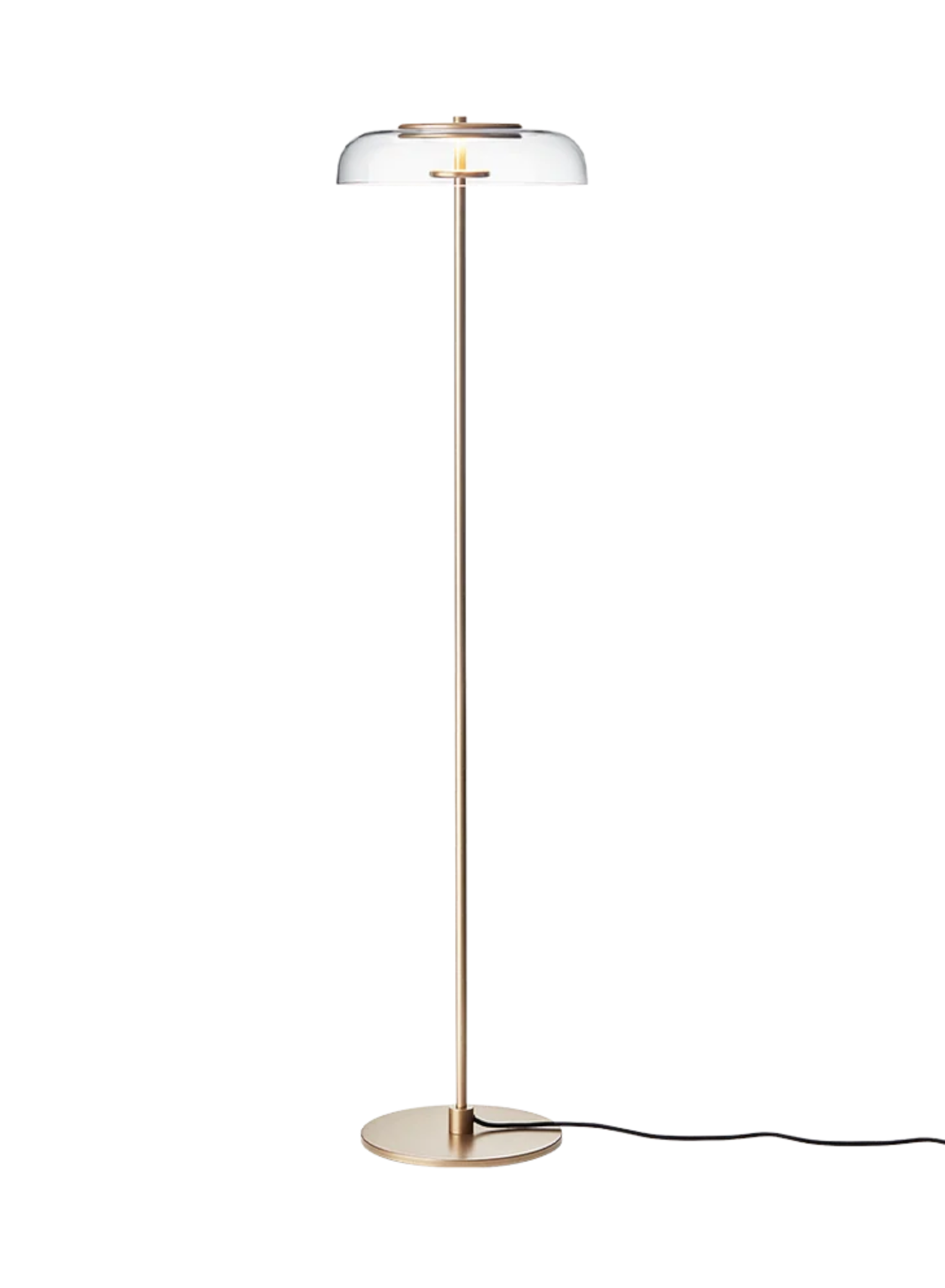 Blossi floor lamp in warm gold finish with slender stem, round base and clear curved glass shade, full front view.