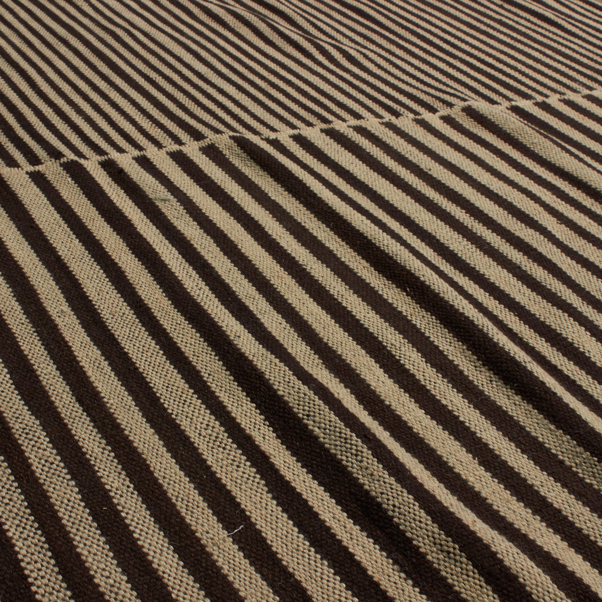 An homage to the quintessential Moroccan rug, ancient patterns are reimagined as bold, geometric forms.