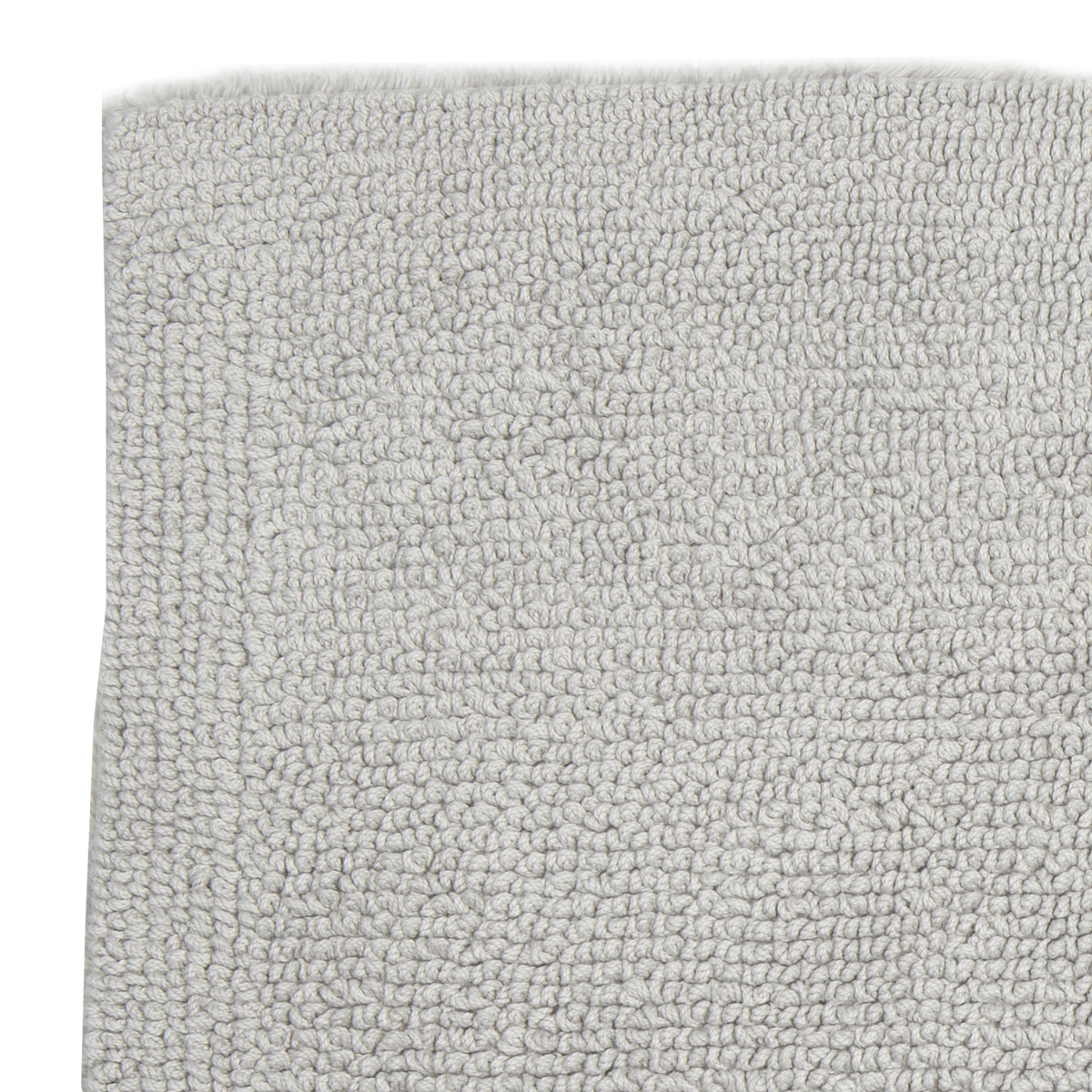 The Bay bath mat is made in Portugal from 100% Egyptian cotton for a soft feel.
