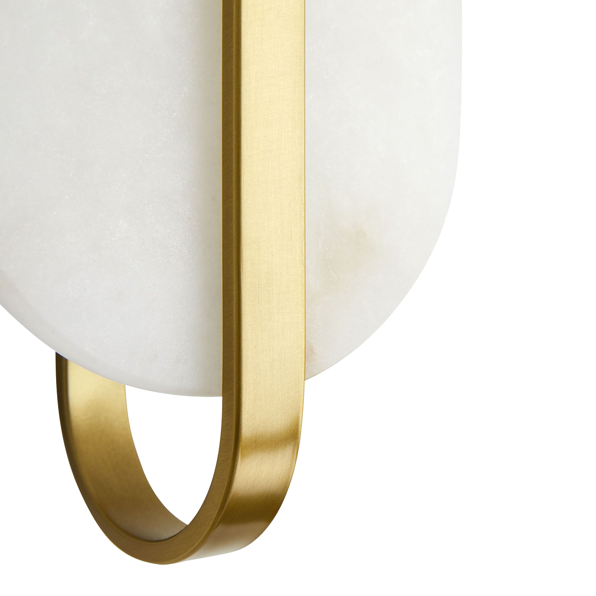 The Julius is a classically-modern design showcasing a capsule-shaped white alabaster foundation, met with an antique brass steel bracket perfectly centered.