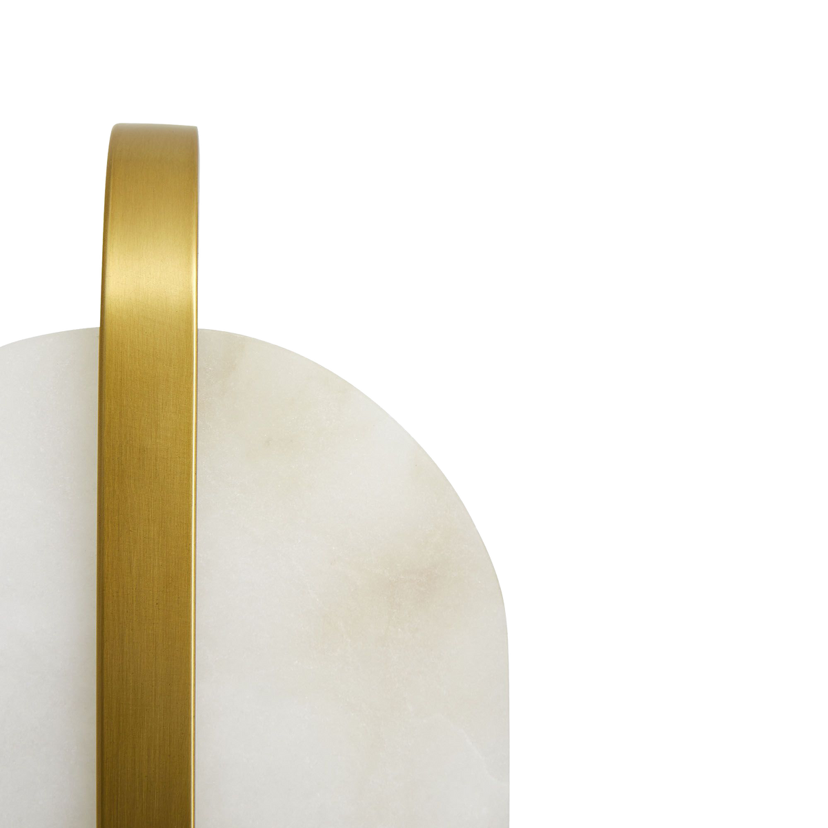 The Julius is a classically-modern design showcasing a capsule-shaped white alabaster foundation, met with an antique brass steel bracket perfectly centered.