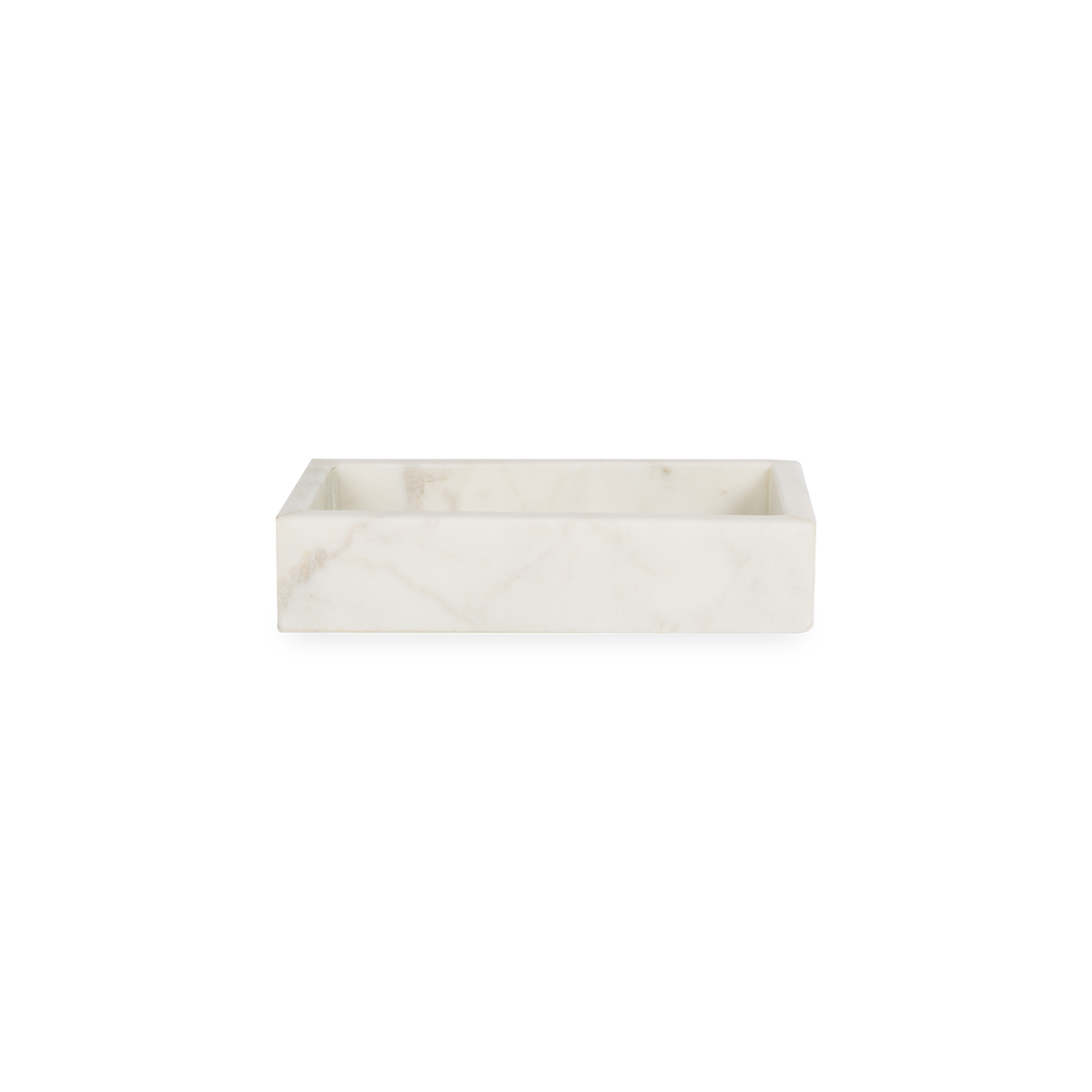A collection of solid marble countertop pieces with a matte finish.