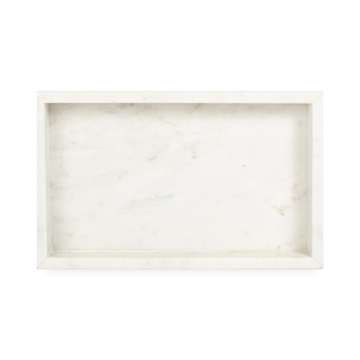 A collection of solid marble countertop pieces with a matte finish.