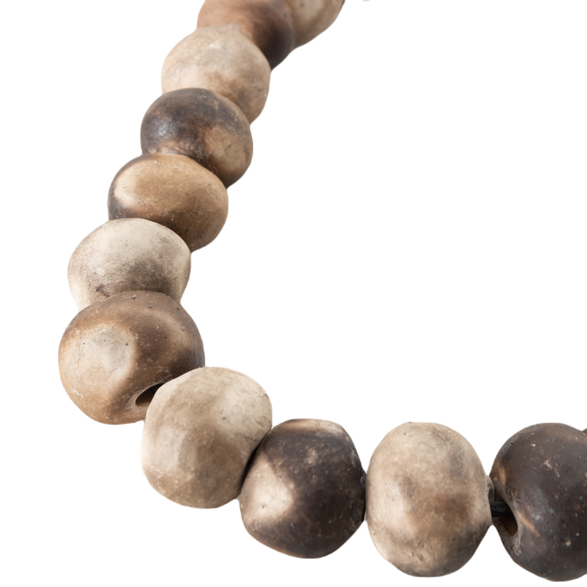 The Beaded Necklace is a beautiful piece that is handmade through a process that allows the ceramic beads to have unique natural colours and gradients.