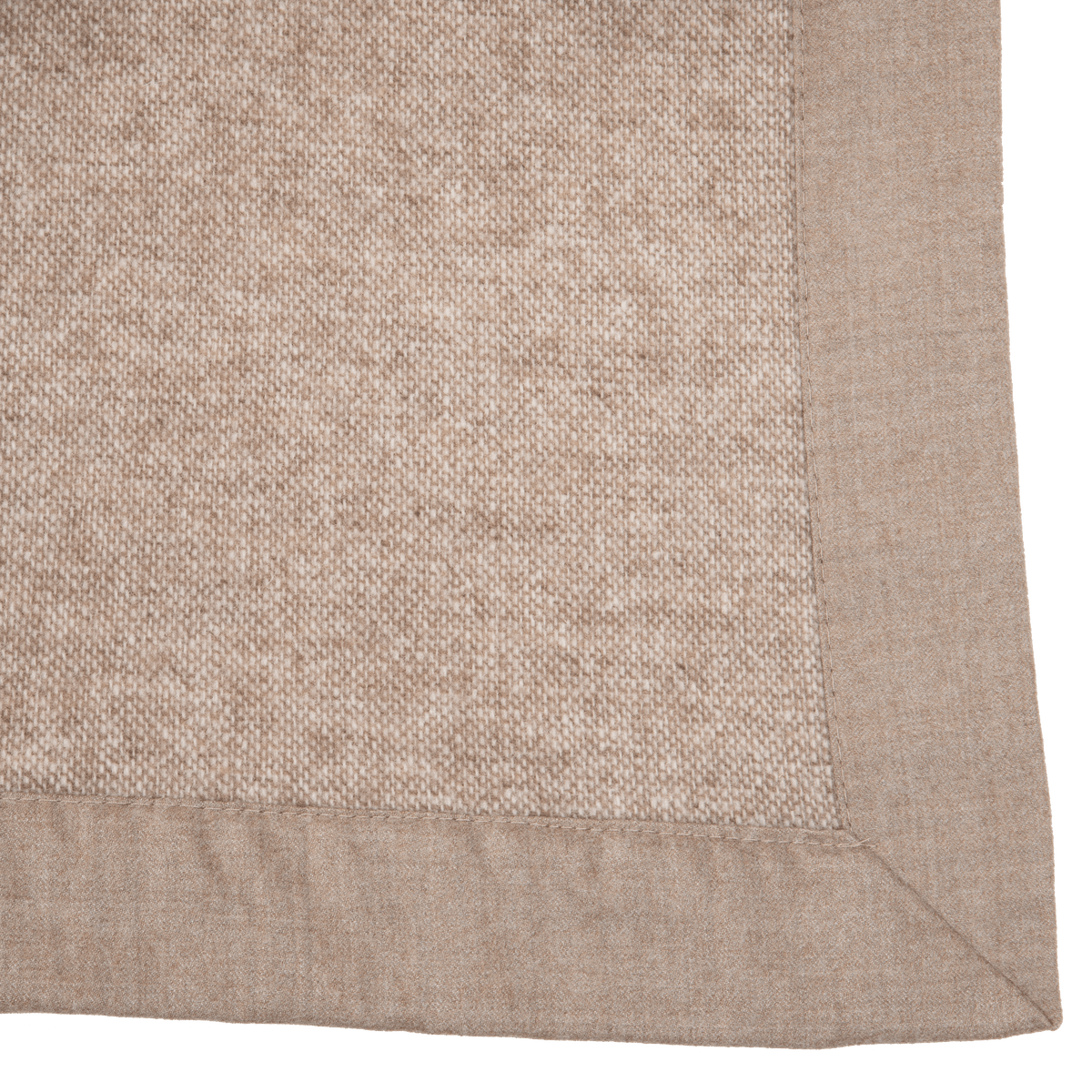 Woven in super-fine Merino wool, the Nerino blanket adds superior warmth and is reversible with differing front and back hues.