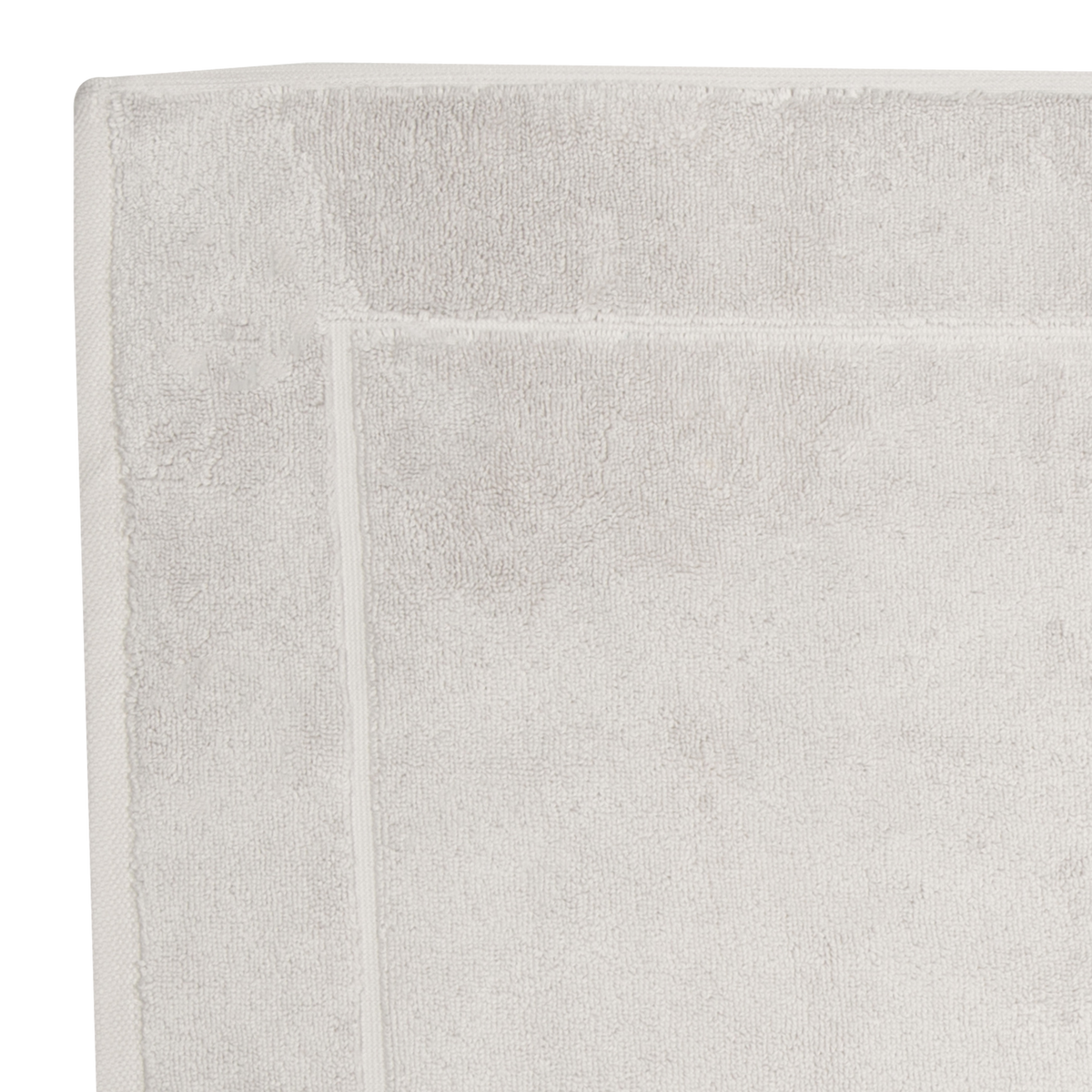 The Sarma Tab Mat uses a dreamy color palette that is woven with simple finished hems for a clean, modern look.