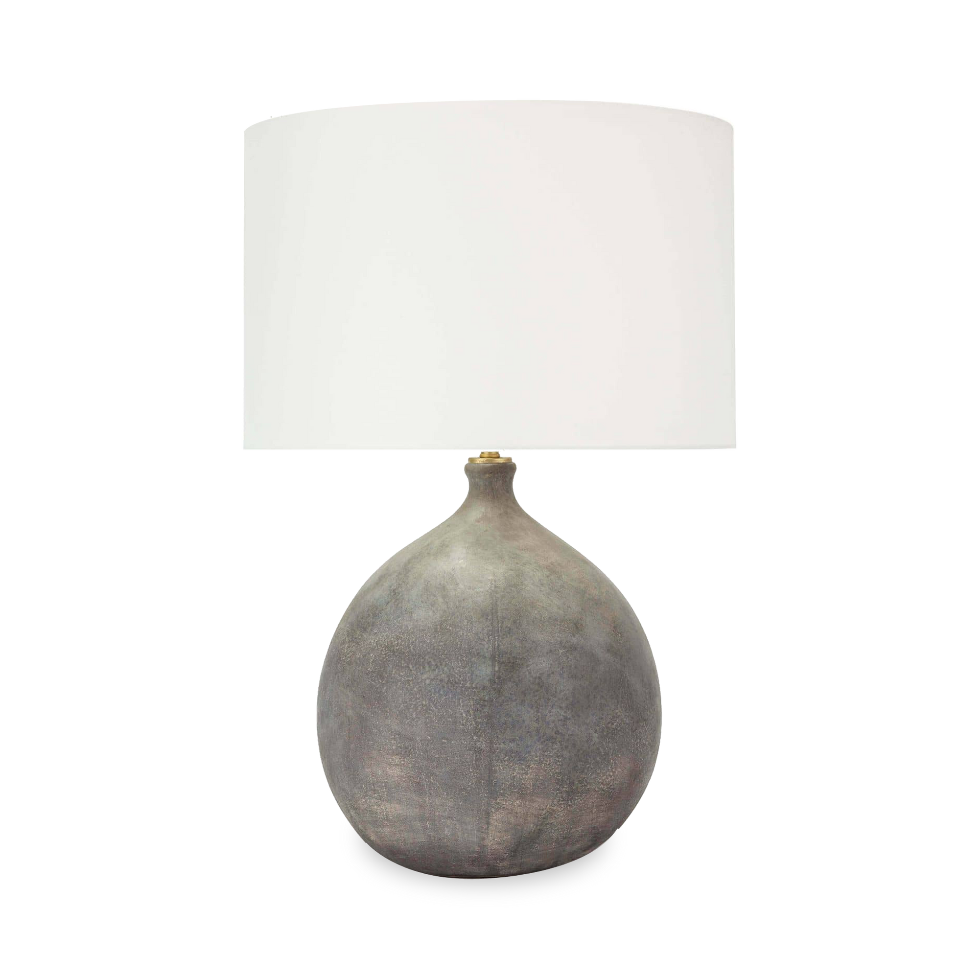 With it's beautiful earthen tones, natural texture and curved shape, the Dover Ceramic Table Lamp is a versatile piece lending to aesthetics ranging from coastal to modern.