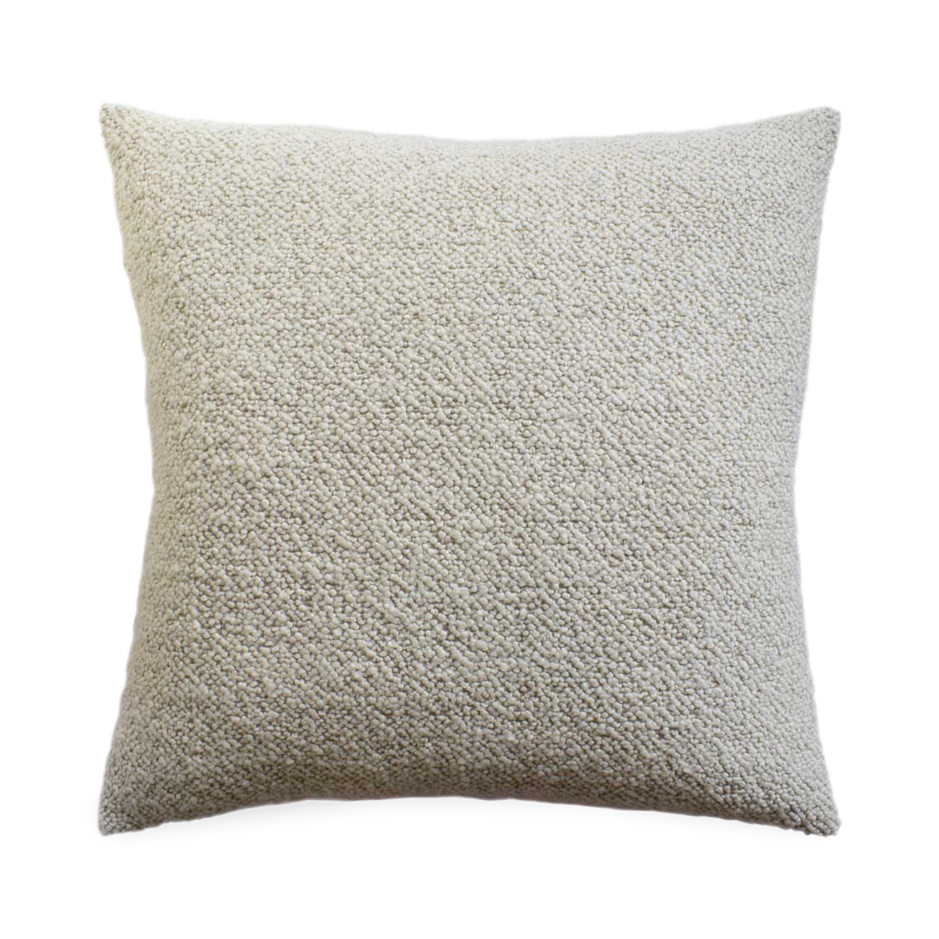 The Tasmin pillow features a plush texture and monocromatic palette.