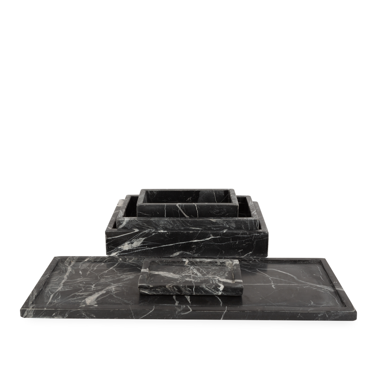 Beautifully handcrafted by skilled artisans, the Marble Collection accessories are made from black marble with natural white veins.