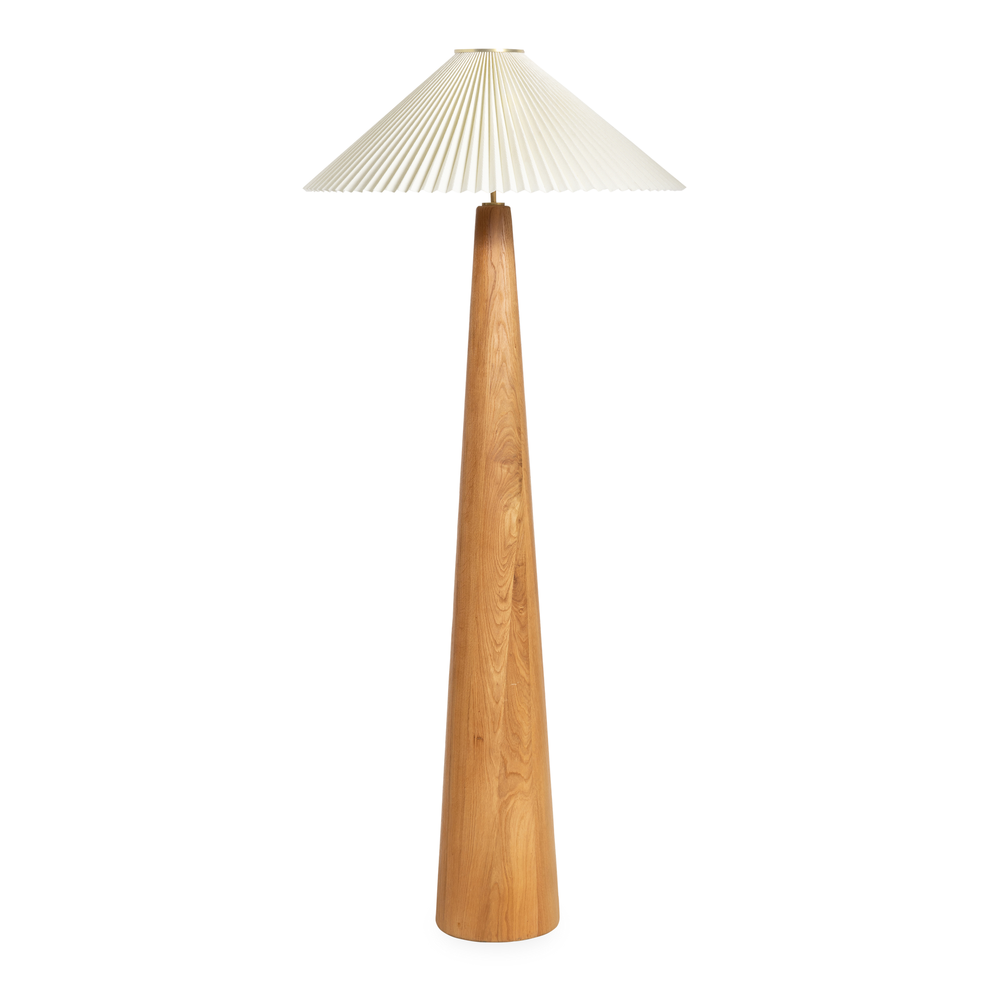 The Nora Floor Lamp gives off a vintage vibe with its folded shade and long wooden stand.