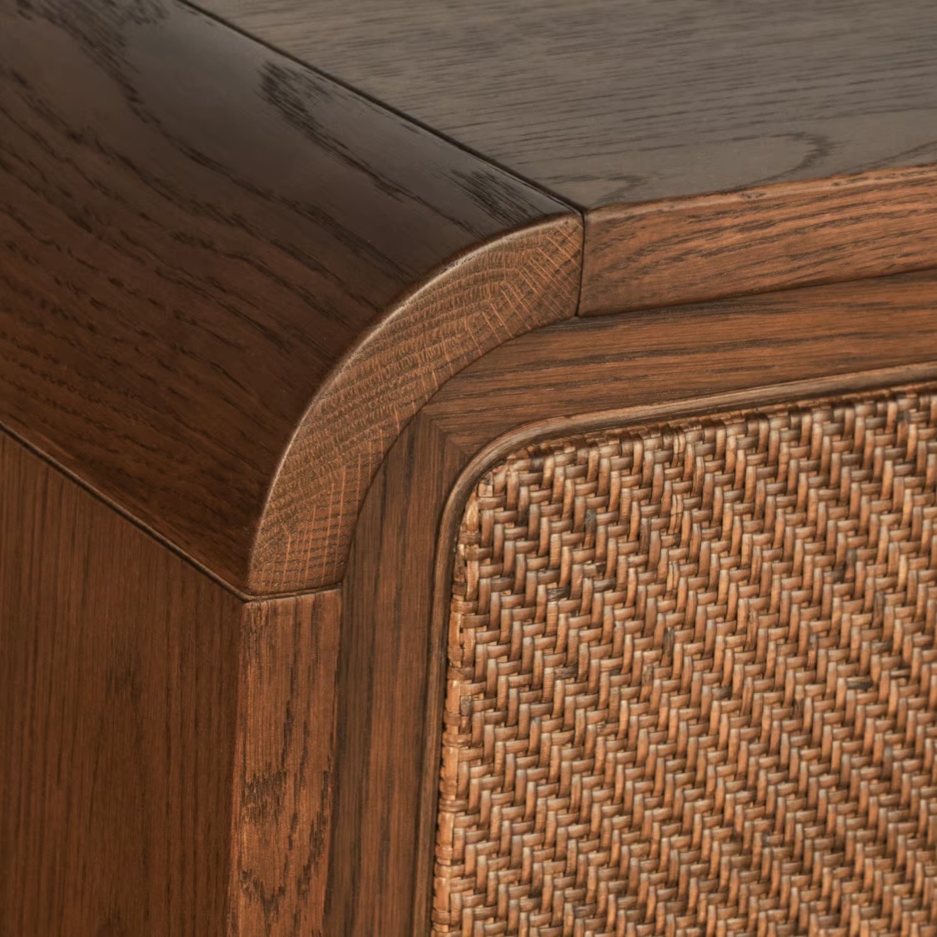 Cabo Nightstand detail showing rounded wood corner and woven drawer front