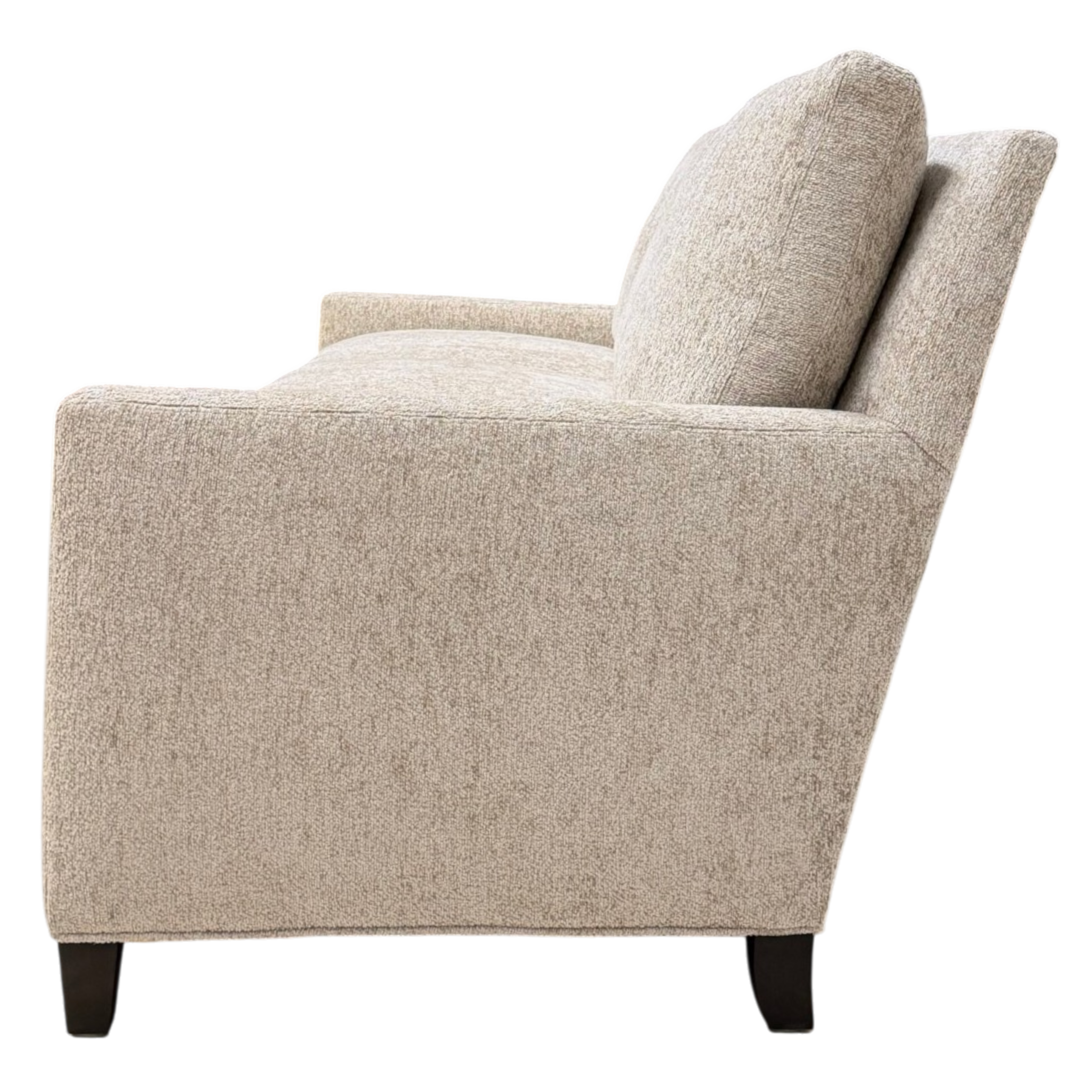 Side view of the Weston Sofa highlighting its low-profile frame, angled back, slim track arm and plush cushioning.