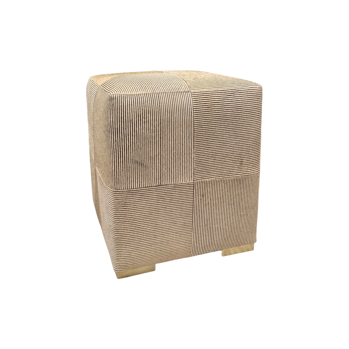 Angled view of Viktor Stool showing alternating striped hair-on-hide panels, softly rounded corners and brass block feet.
