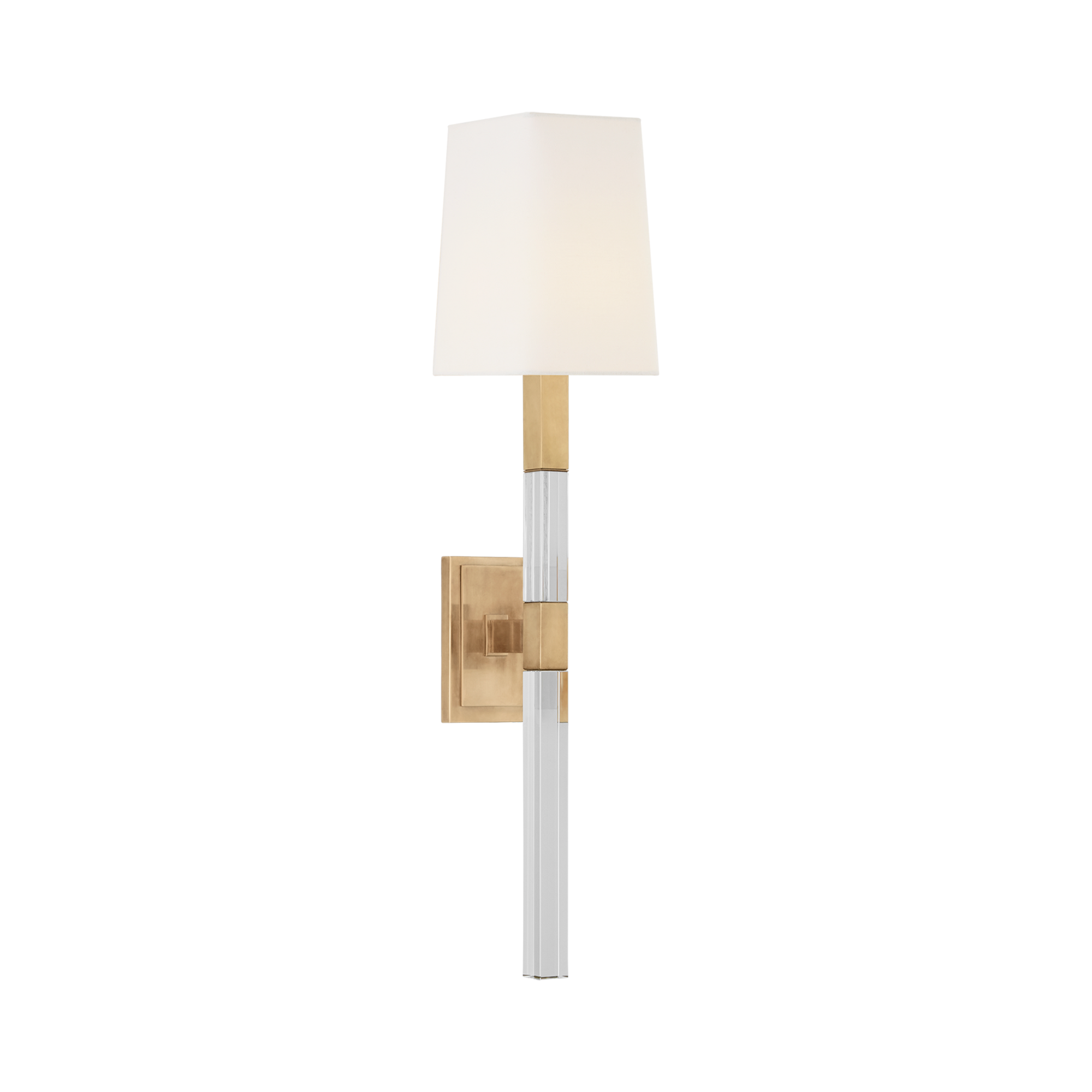 Modern and geometric, the Reagan Medium Tail Sconce combines the translucence of solid crystal with the architectural precision of polished metal.