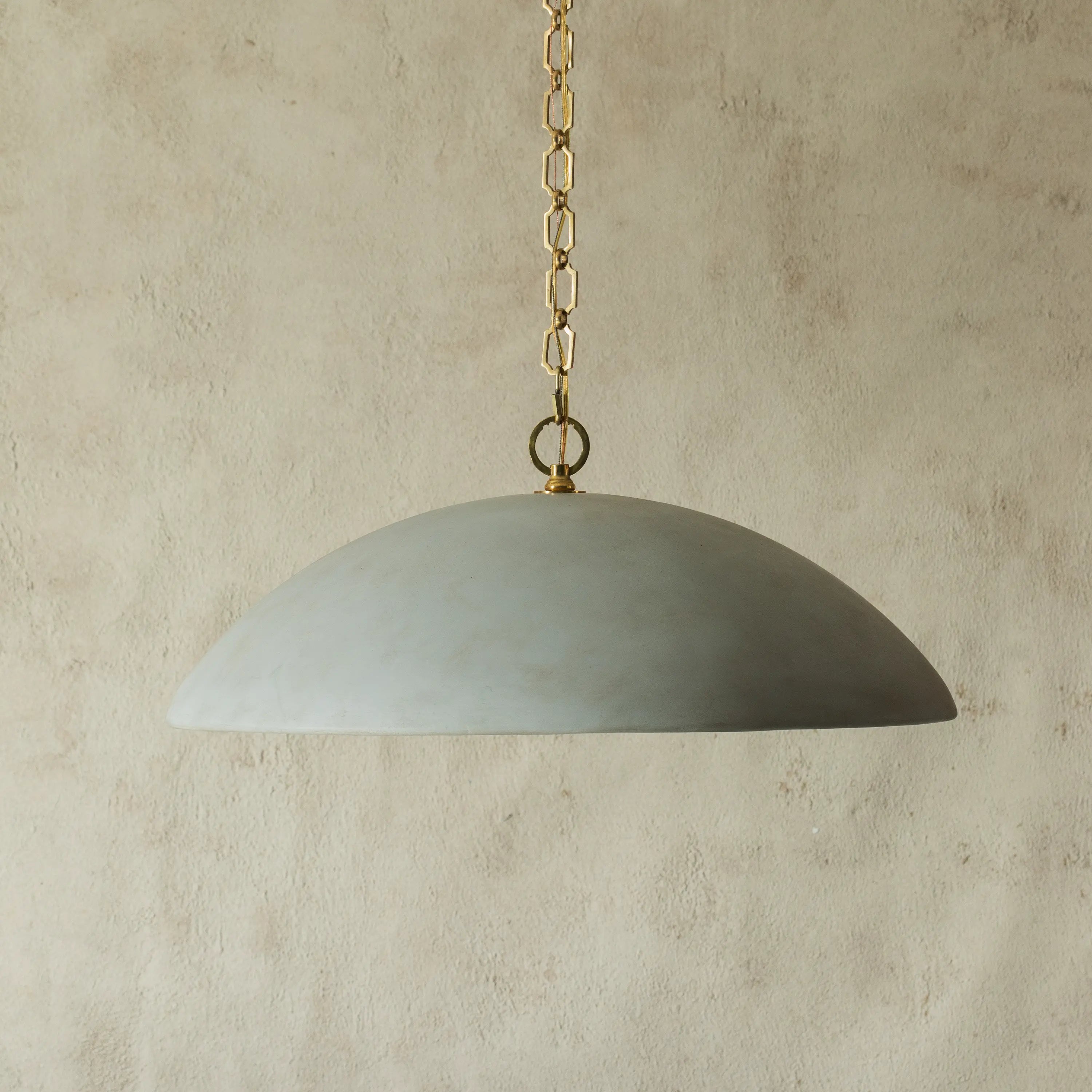 The Elliot Large Pendant Lightoffers a fresh mix of continental and classic style, emphasizing the antiques and collections that create a special setting.