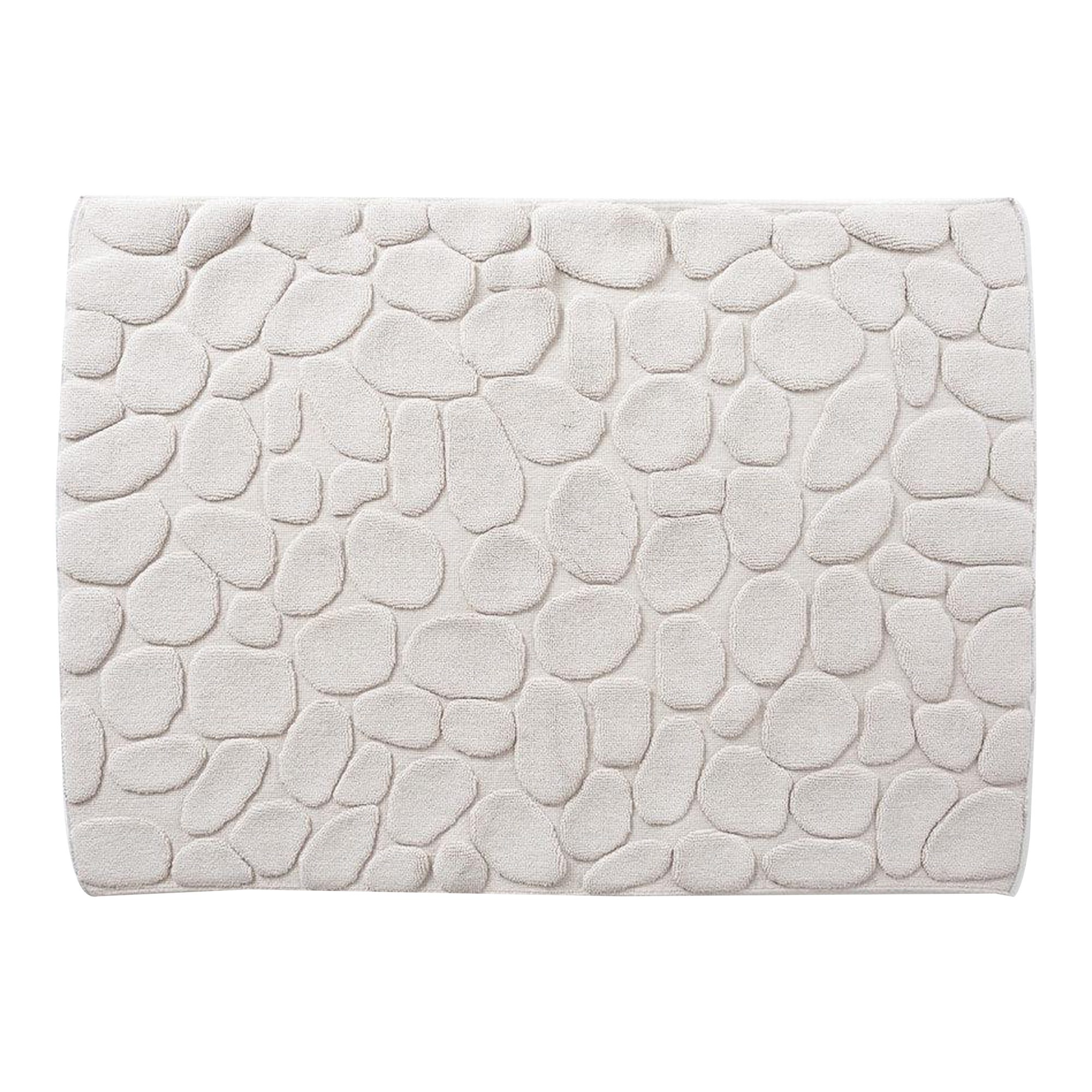 Inspired by the natural stones found in Japanese riverbeds, the Ishikoro Pebble Bath Mat was designed by Masaru Suzki and features a padded texture that feels great under your feet