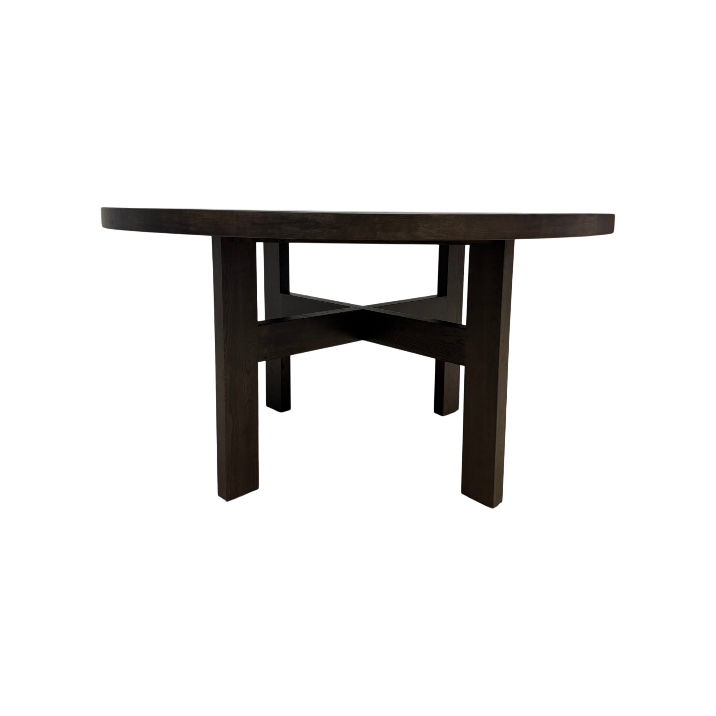 Rear view of Chino Dining Table showing the dark smoked ash finish and geometric crossed stretcher base.