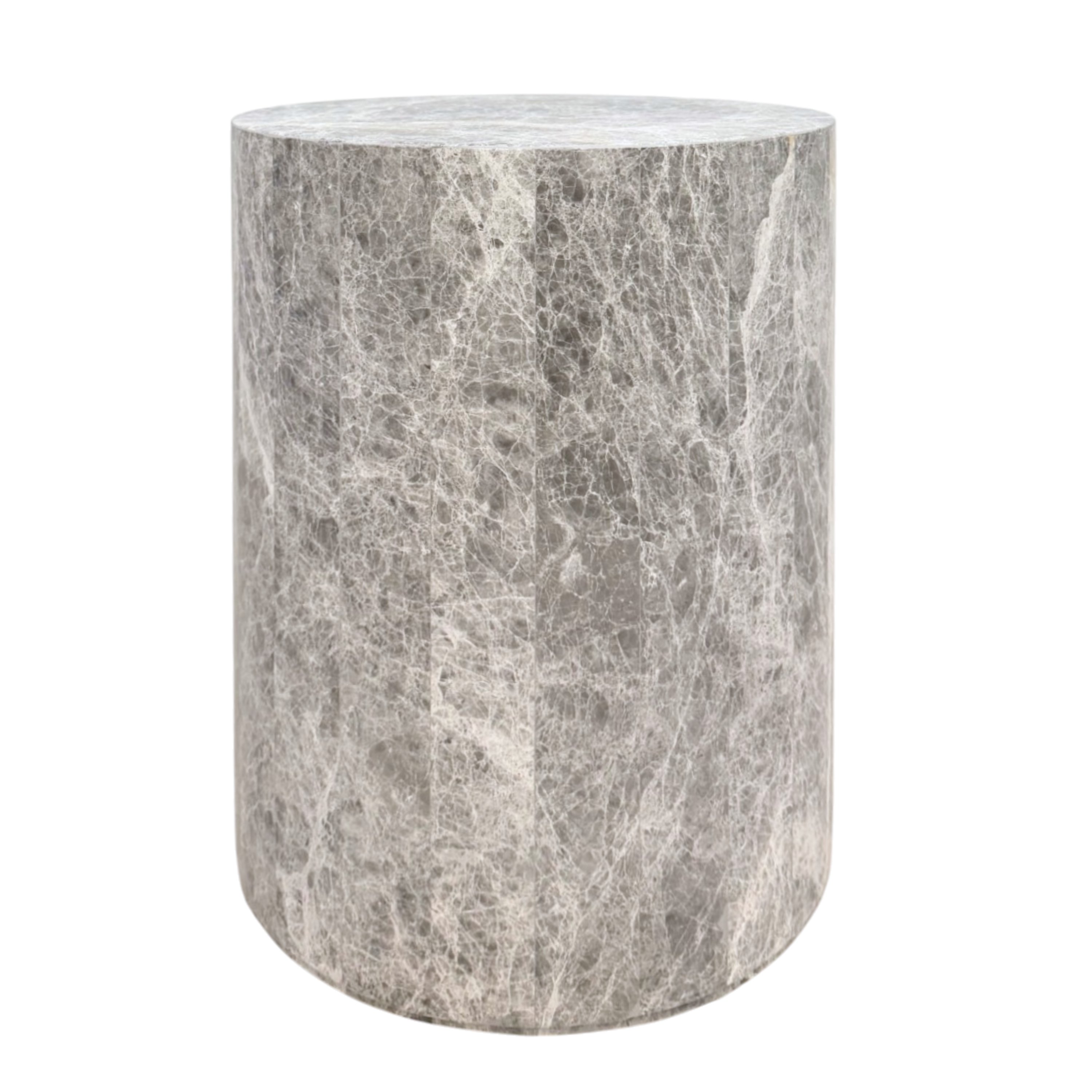 Ward Side Table in grey stone, featuring a cylindrical silhouette with a smooth round top, vertical panel detailing and delicate white veining throughout.