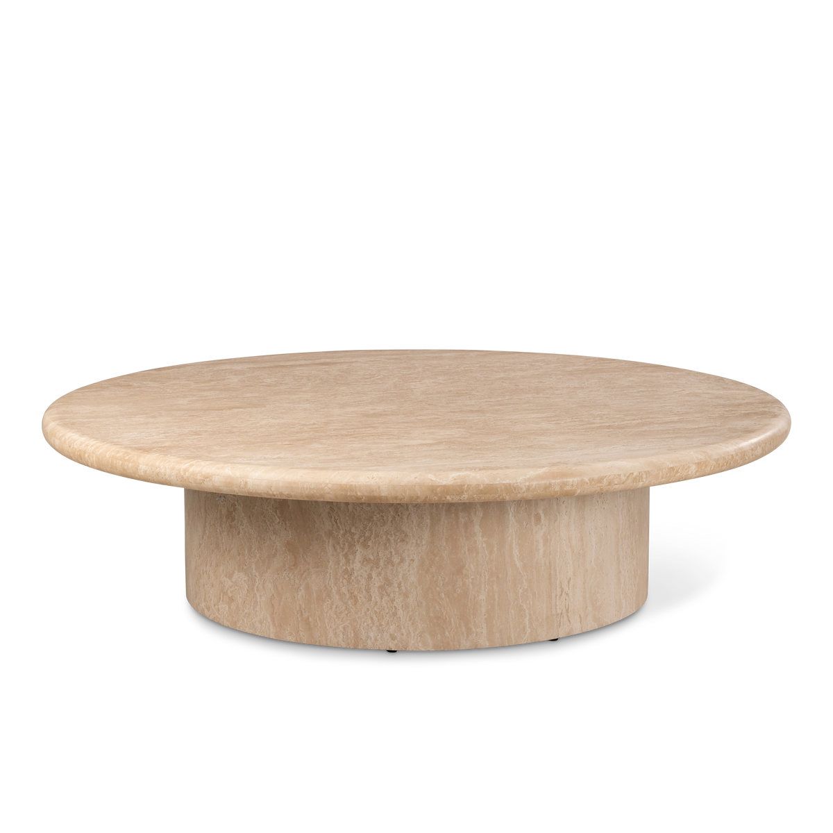 Aldo Coffee Table shown from the front in warm beige Turkish travertine, with a low round top overhanging a wide cylindrical base.