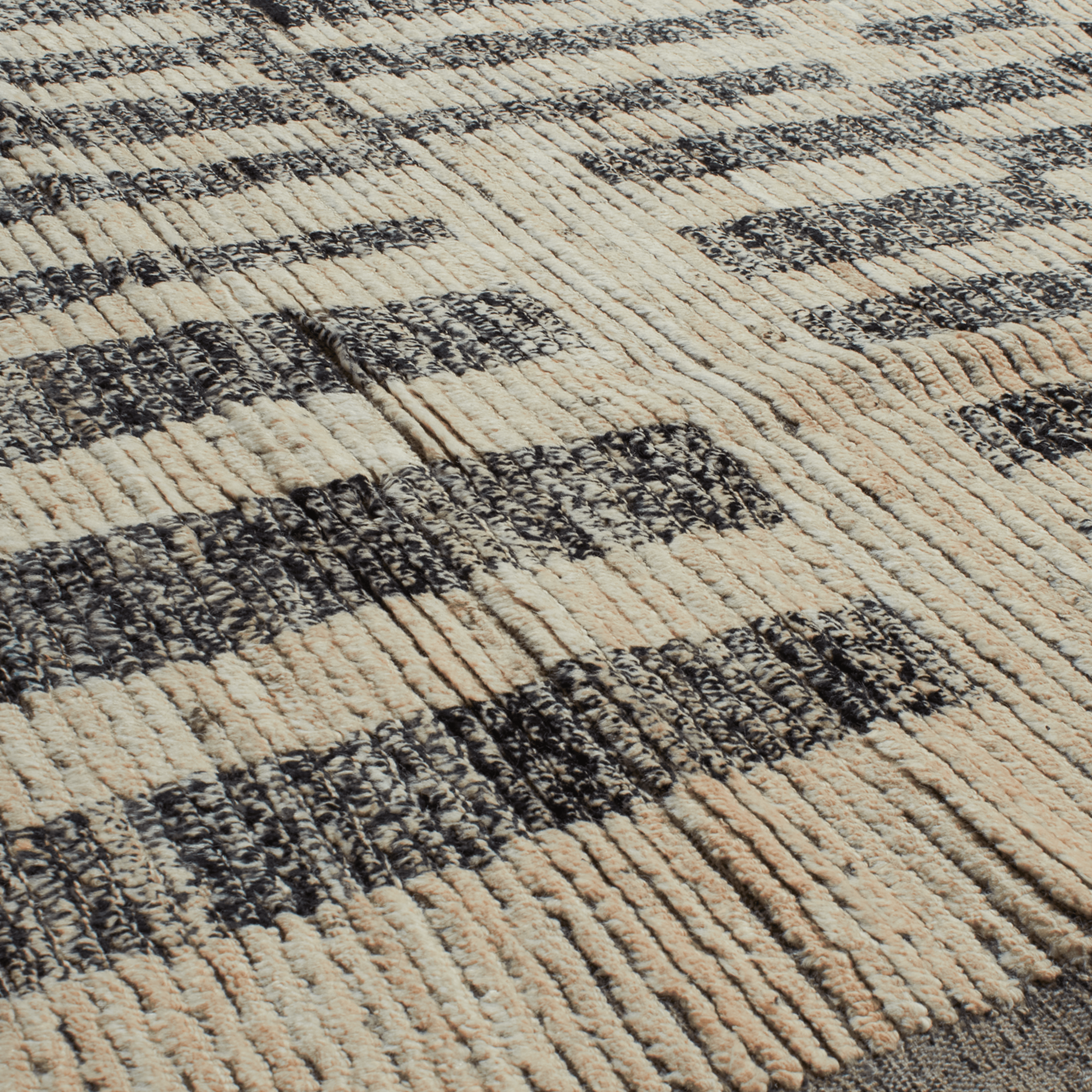 Revered for its lustre and soft hand, the natural qualities of wool from ancient Karakul sheep are honoured through restraint and refinement.